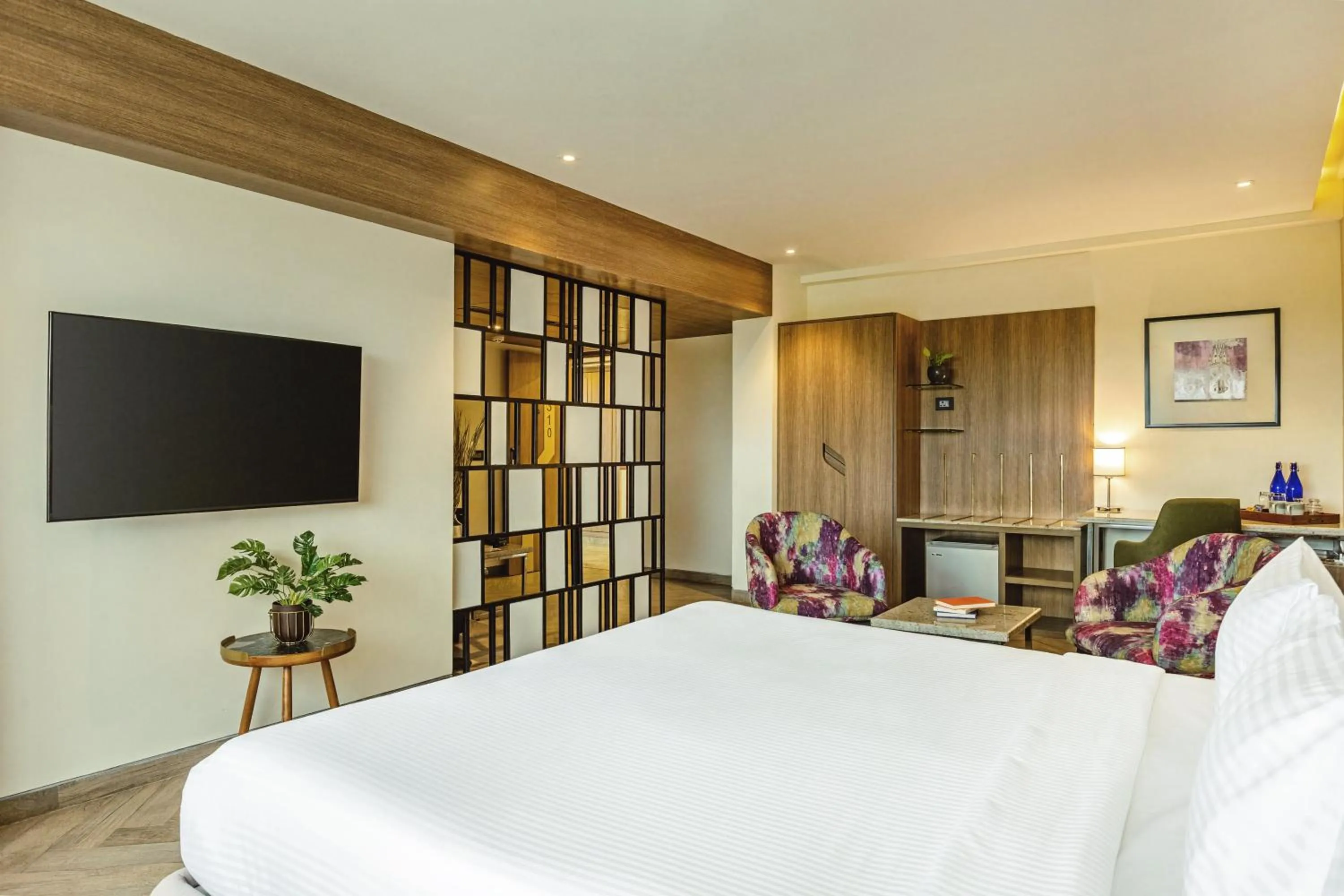 Communal lounge/ TV room, Bed in Mango Hill Central Chennai