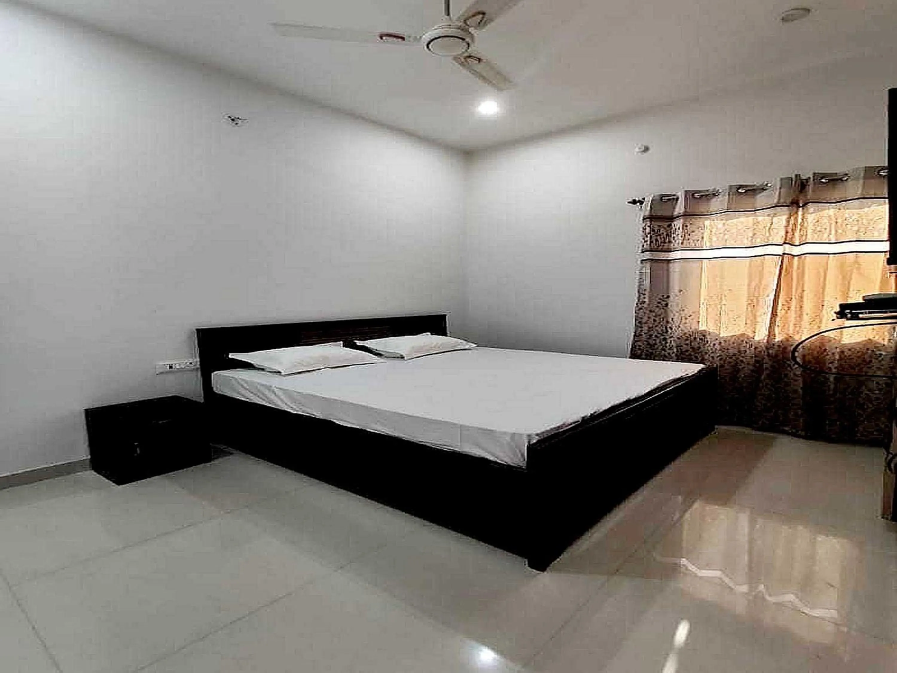 Bedroom in Hotel O S.K.GOLD