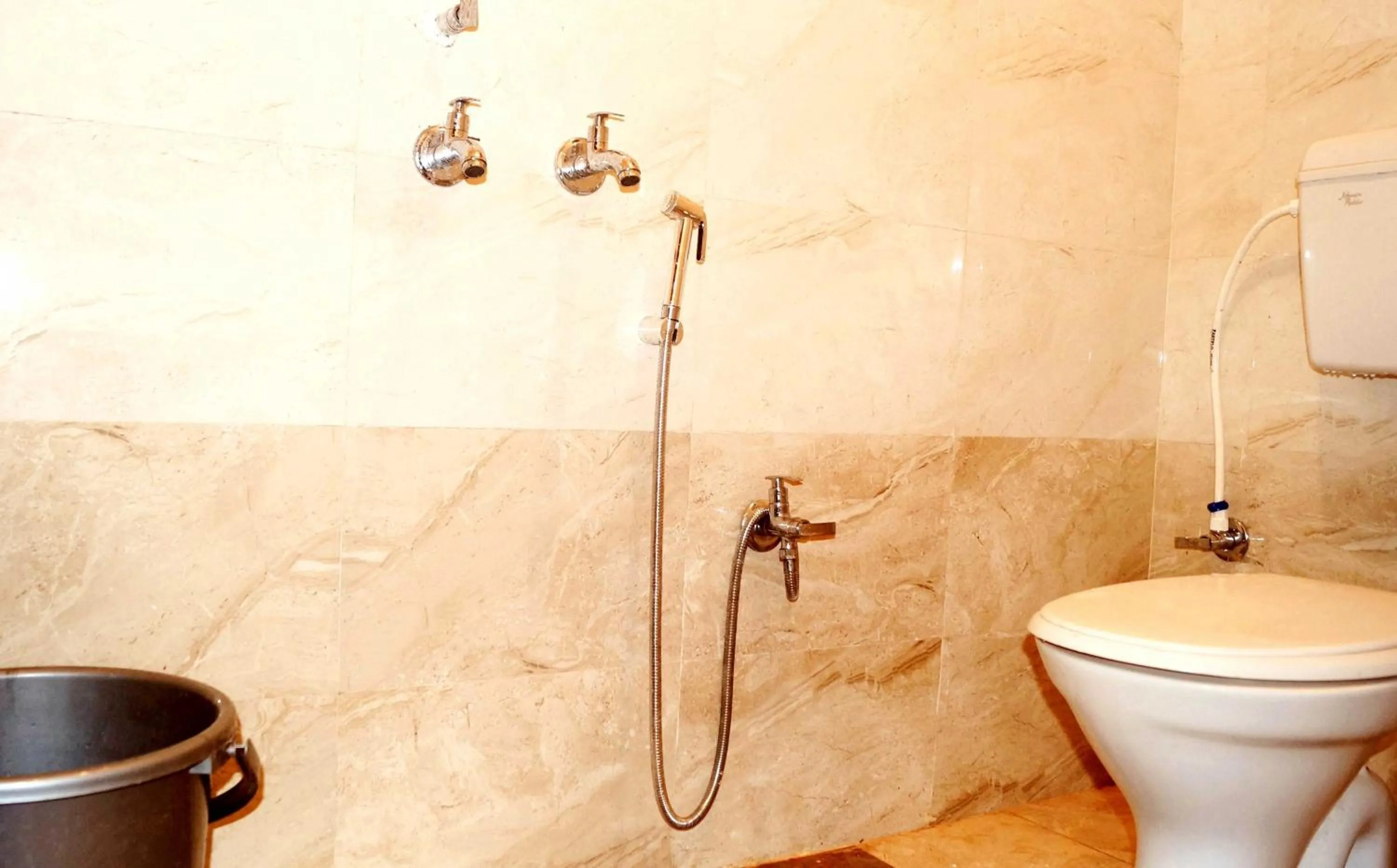 Bathroom in Hotel O Mishra Suites