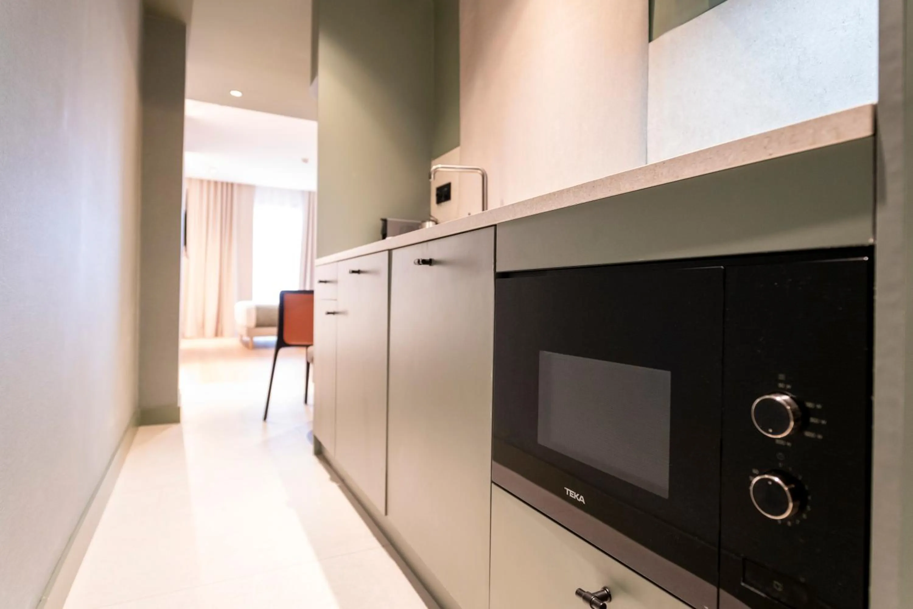 Kitchen or kitchenette in Aparthotel Atenea Calabria