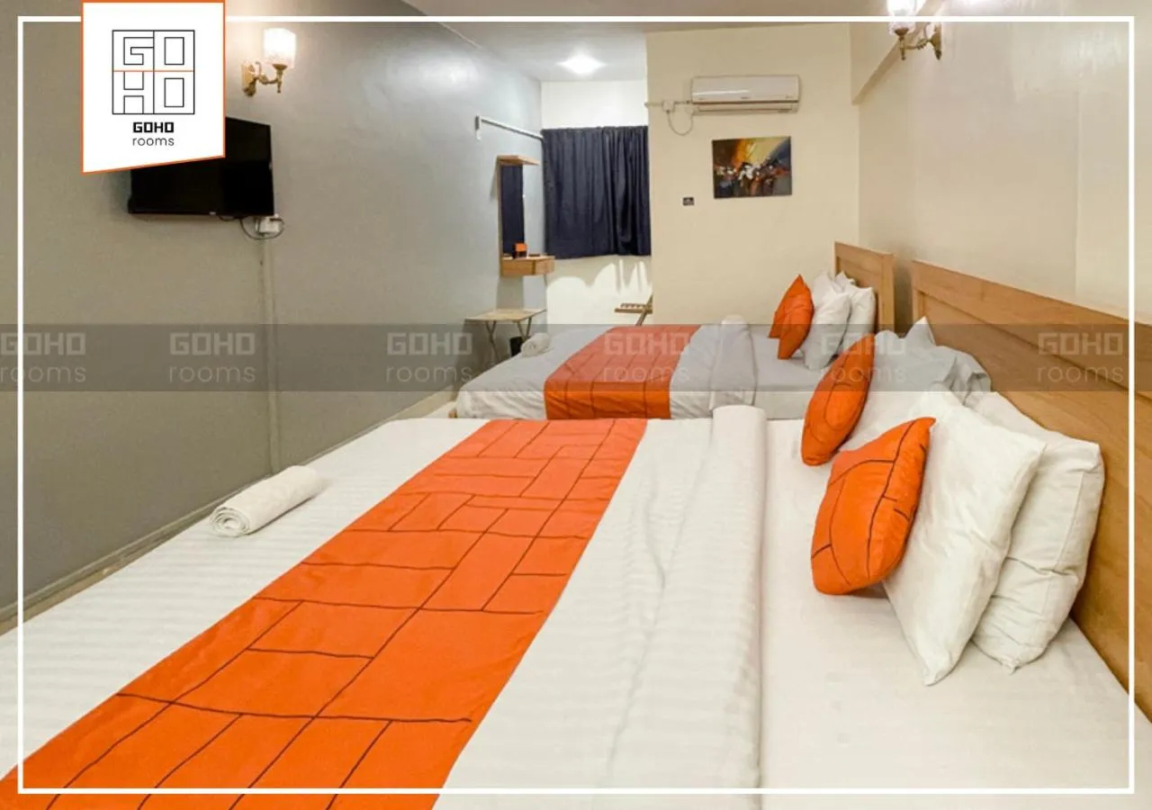 Bed in GOHO Rooms 10th Commercial