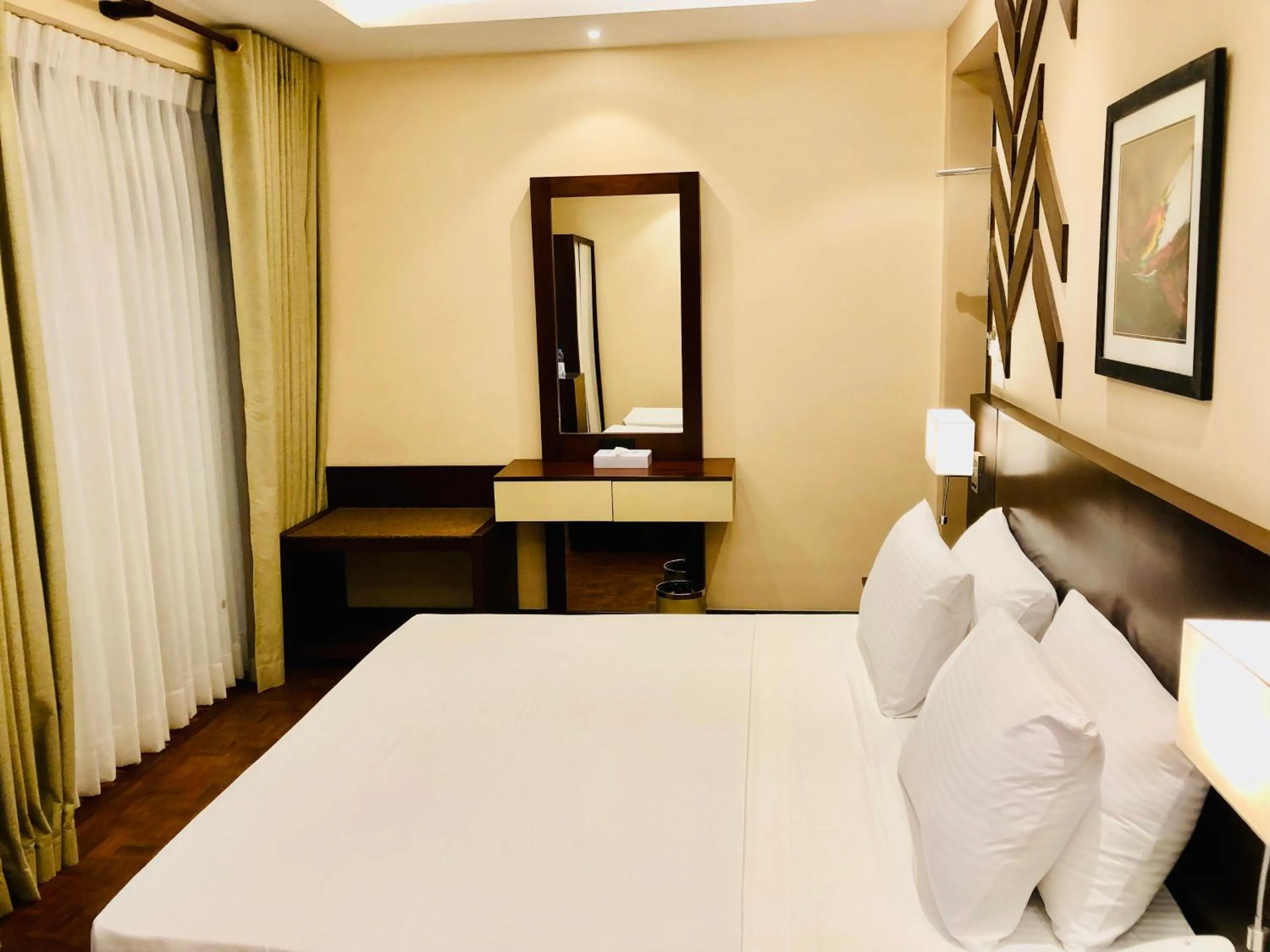 Bed in Tropic Inn - Mount Lavinia