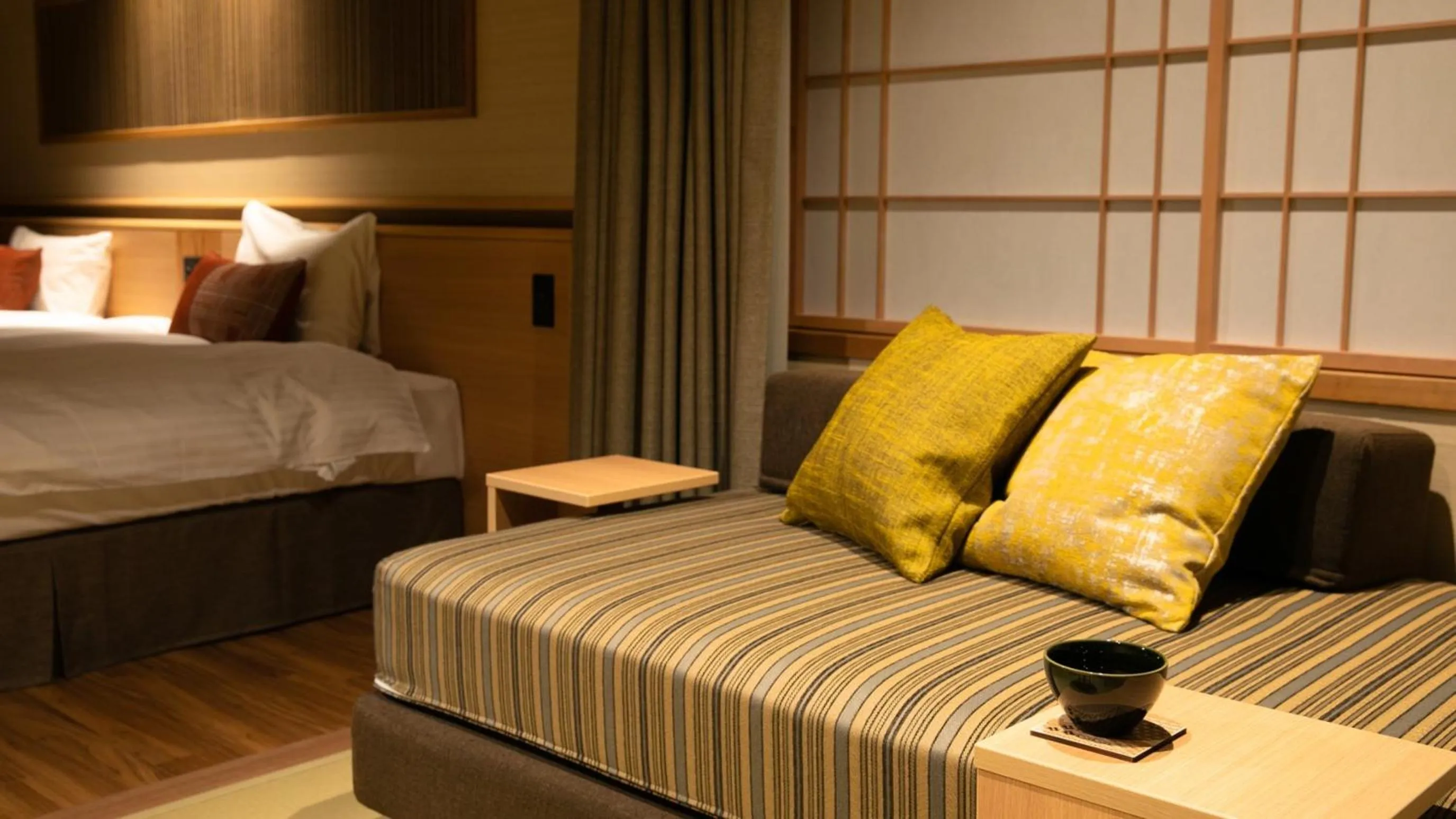 Bed in Kyukamura Retreat-Azumino-Hotel