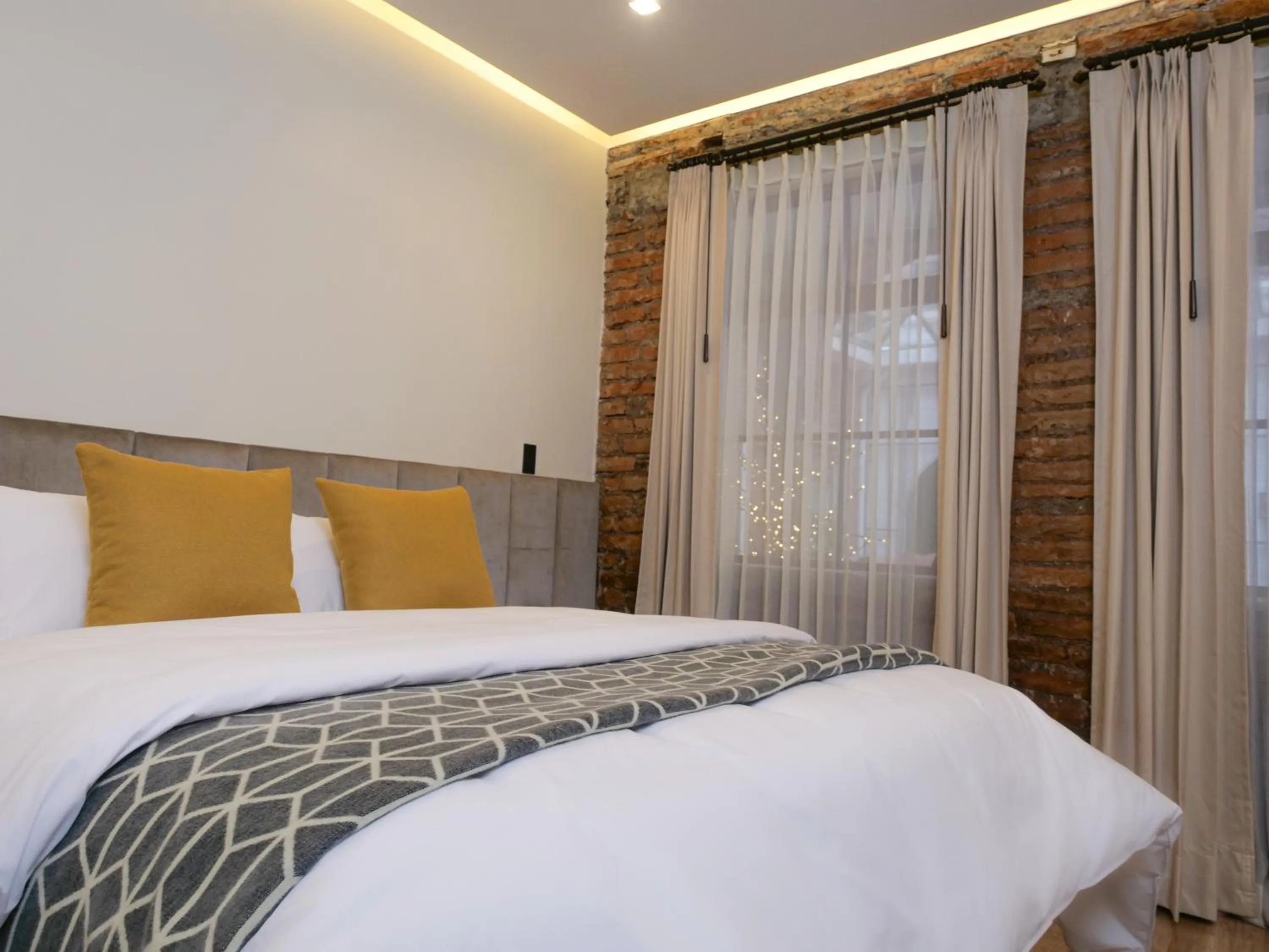 Bedroom, Bed in Wanderlot - Hotel Plaza Central