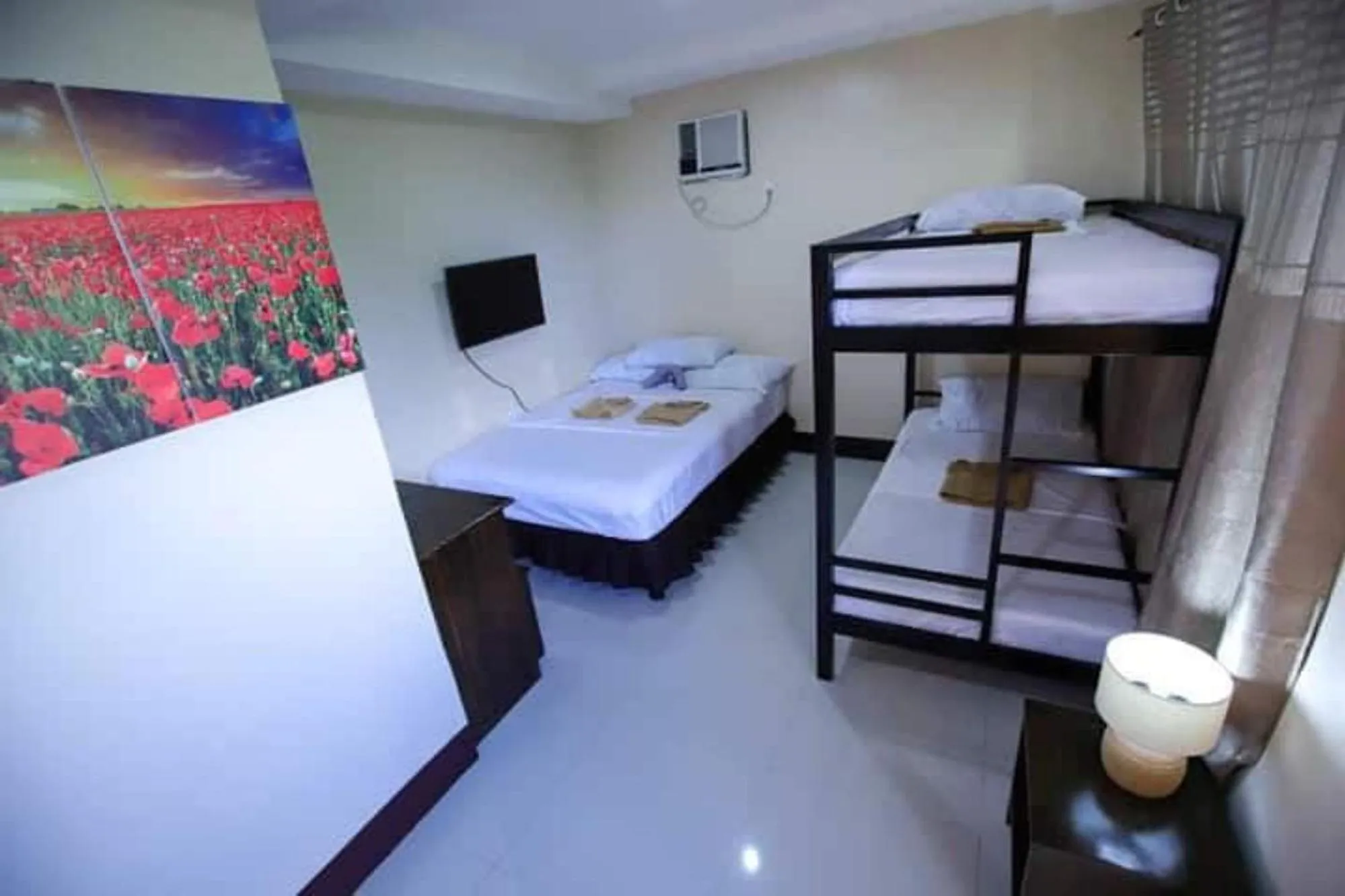 Photo of the whole room, Bed in Marco s Tourist Inn by RedDoorz