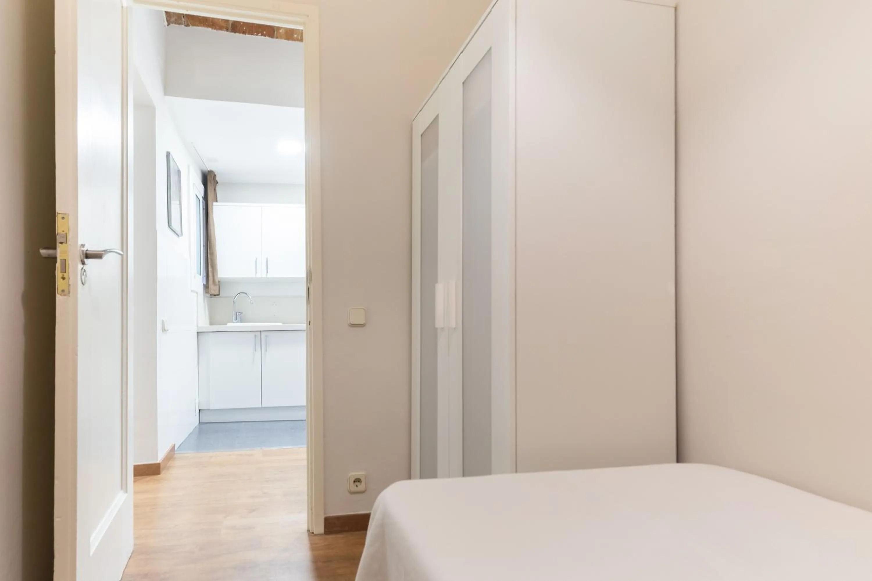 Bed in Atica Apartments - by Weflating