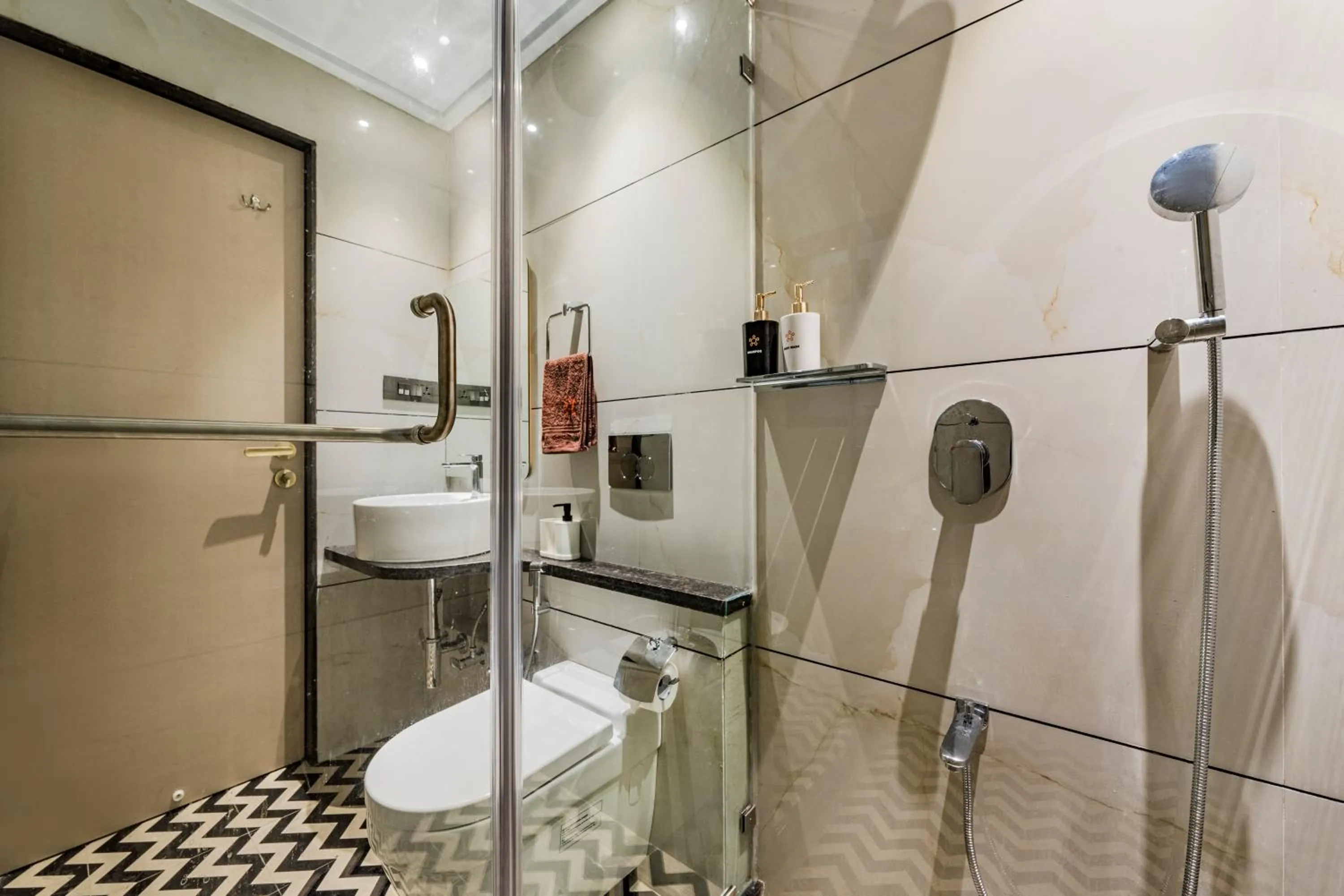 Shower in SaffronStays Nishta - 4BR pet-friendly villa with pool, turf, gazebo & terrace BBQ views in Alibaug