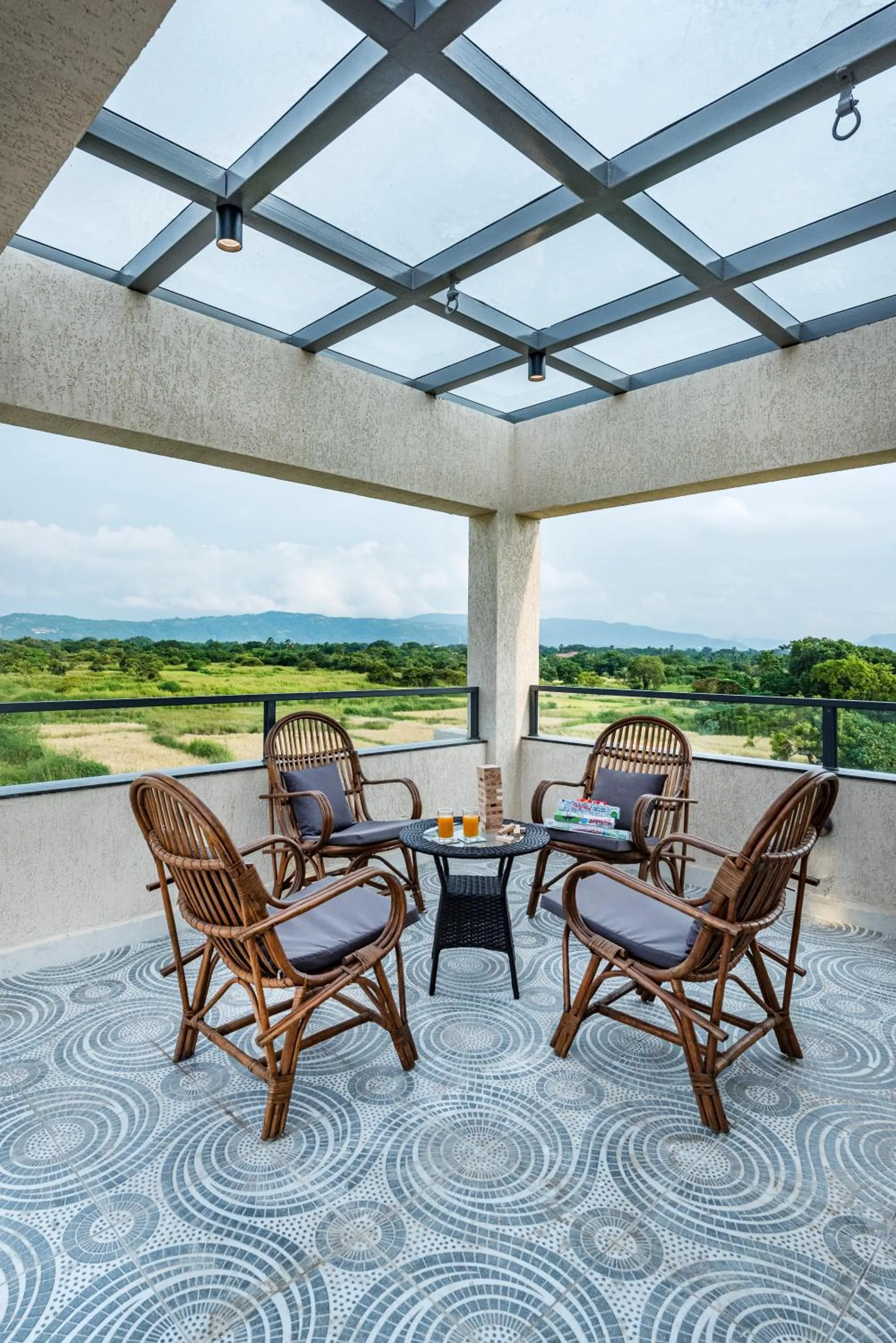 Patio in SaffronStays Nishta - 4BR pet-friendly villa with pool, turf, gazebo & terrace BBQ views in Alibaug