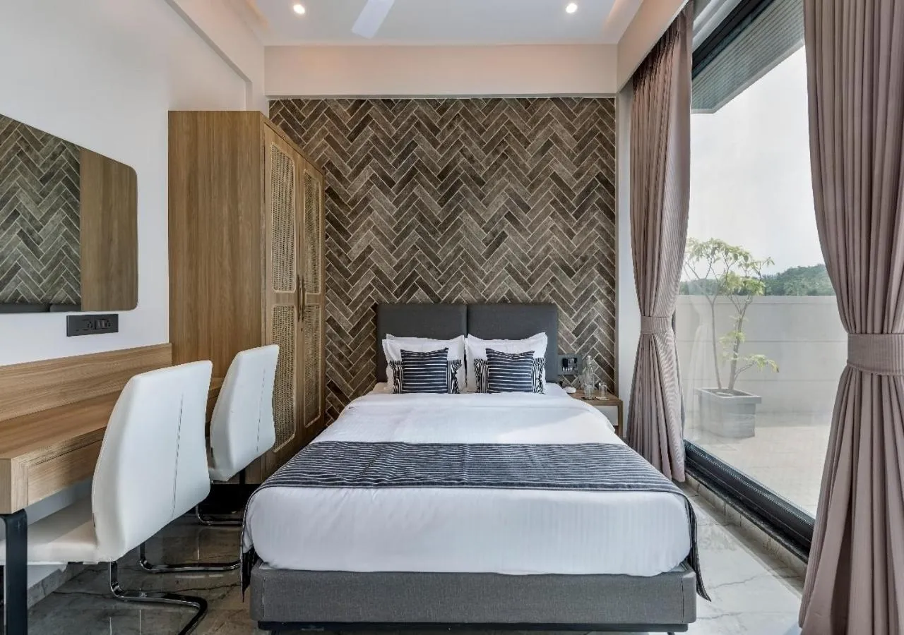 Bed in SaffronStays Nishta - 4BR pet-friendly villa with pool, turf, gazebo & terrace BBQ views in Alibaug