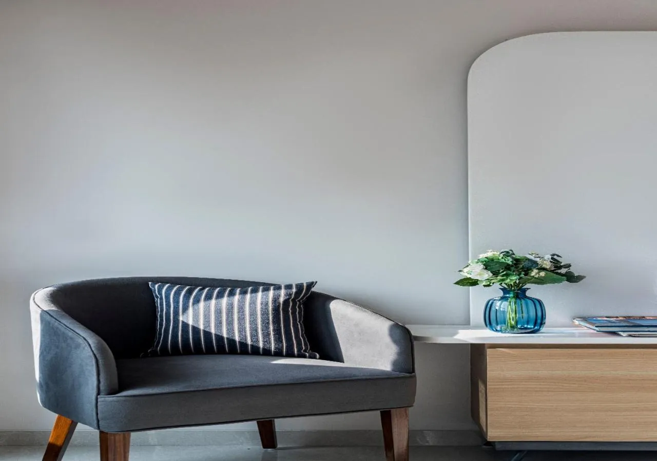 Seating area in SaffronStays Nishta - 4BR pet-friendly villa with pool, turf, gazebo & terrace BBQ views in Alibaug