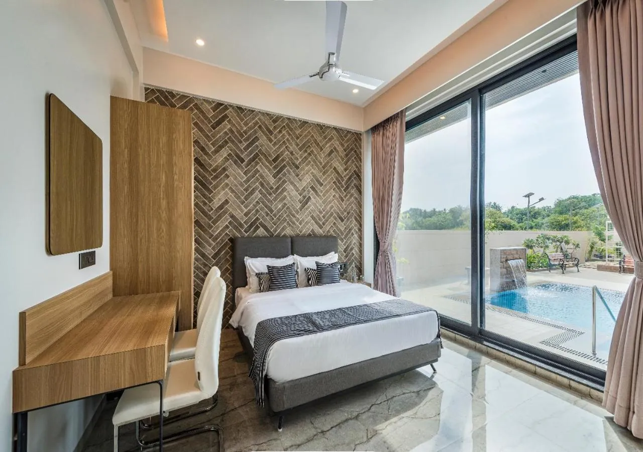 Bed in SaffronStays Nishta - 4BR pet-friendly villa with pool, turf, gazebo & terrace BBQ views in Alibaug