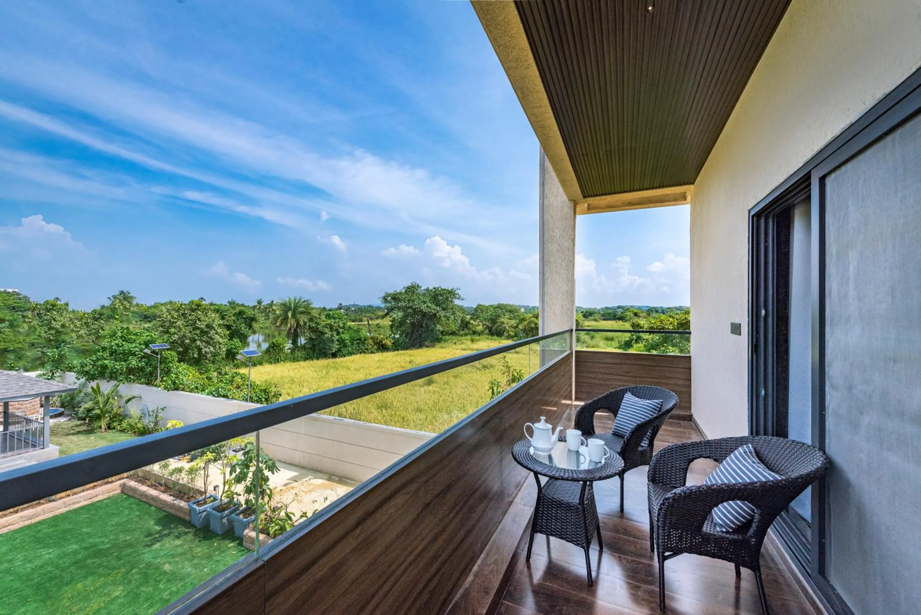 Patio in SaffronStays Nishta - 4BR pet-friendly villa with pool, turf, gazebo & terrace BBQ views in Alibaug