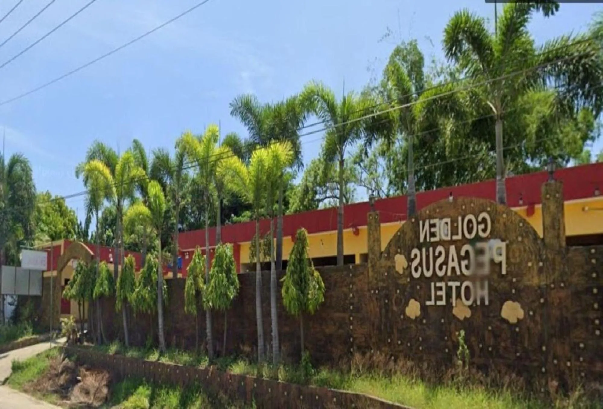 Property building in Golden Pegasus Hotel La Union by RedDoorz