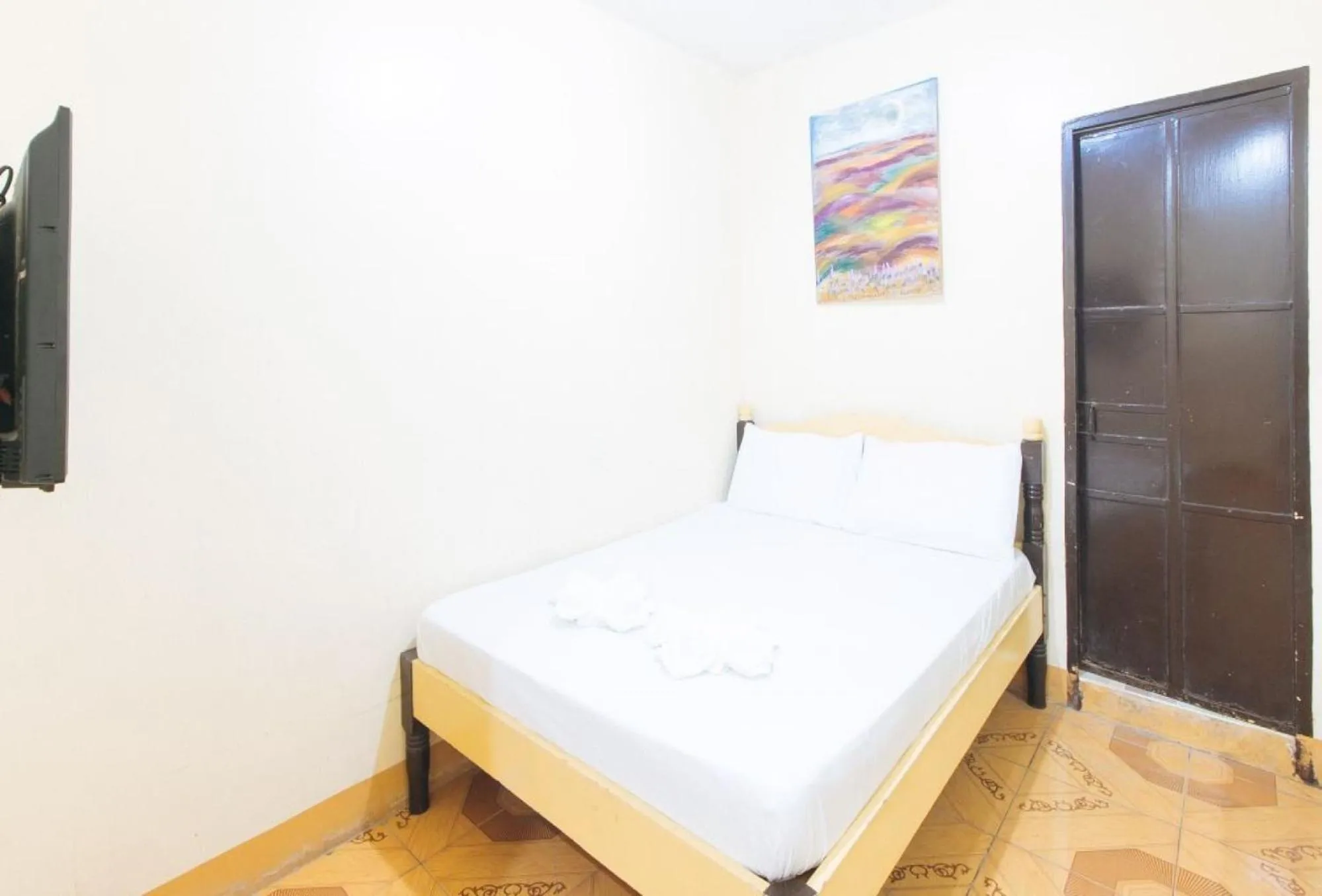 Bed in Golden Pegasus Hotel La Union by RedDoorz