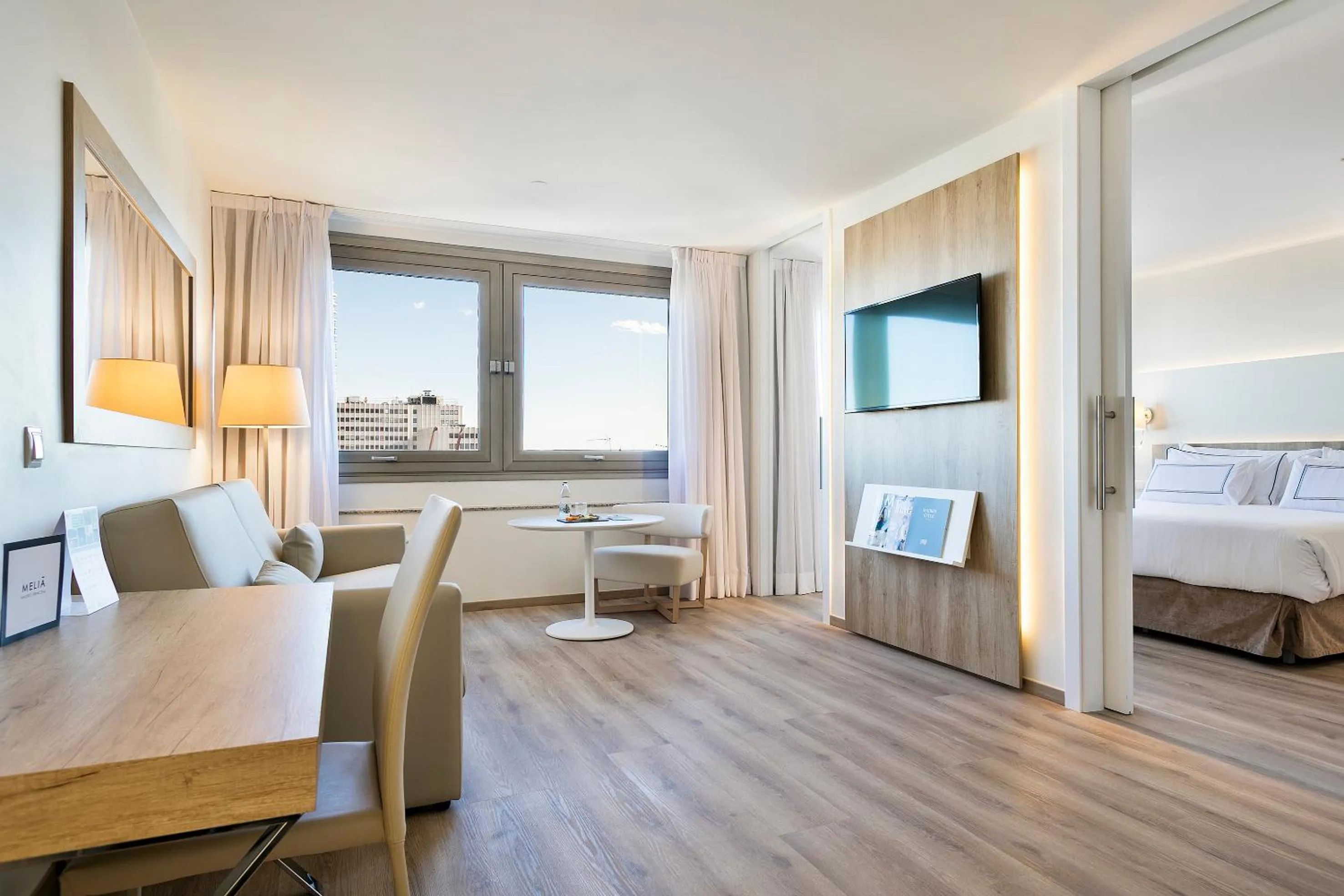 Living room, Bed in Melia Madrid Princesa