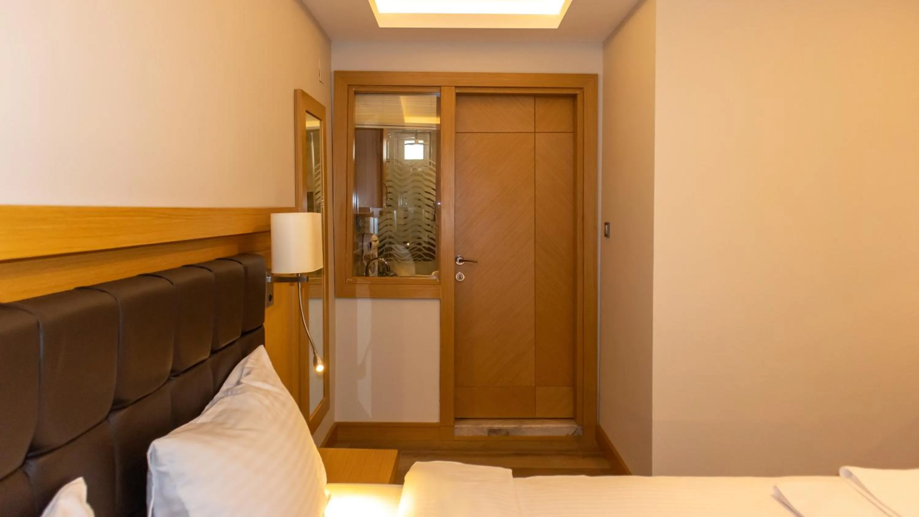 Bed in LOTUSPARK HOTEL