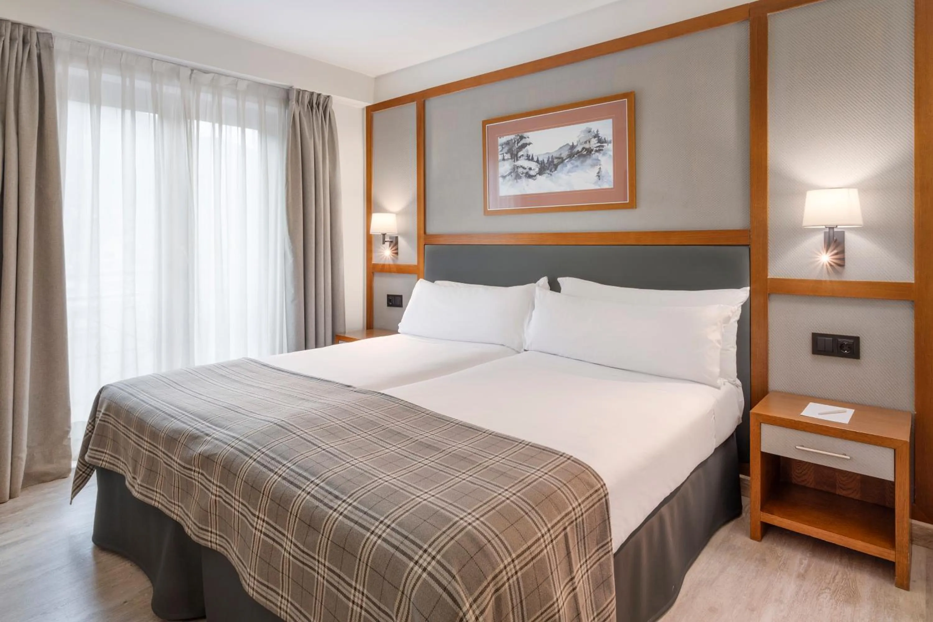 Bed in Hotel Vielha Val d'Aran, Affiliated by Meliá