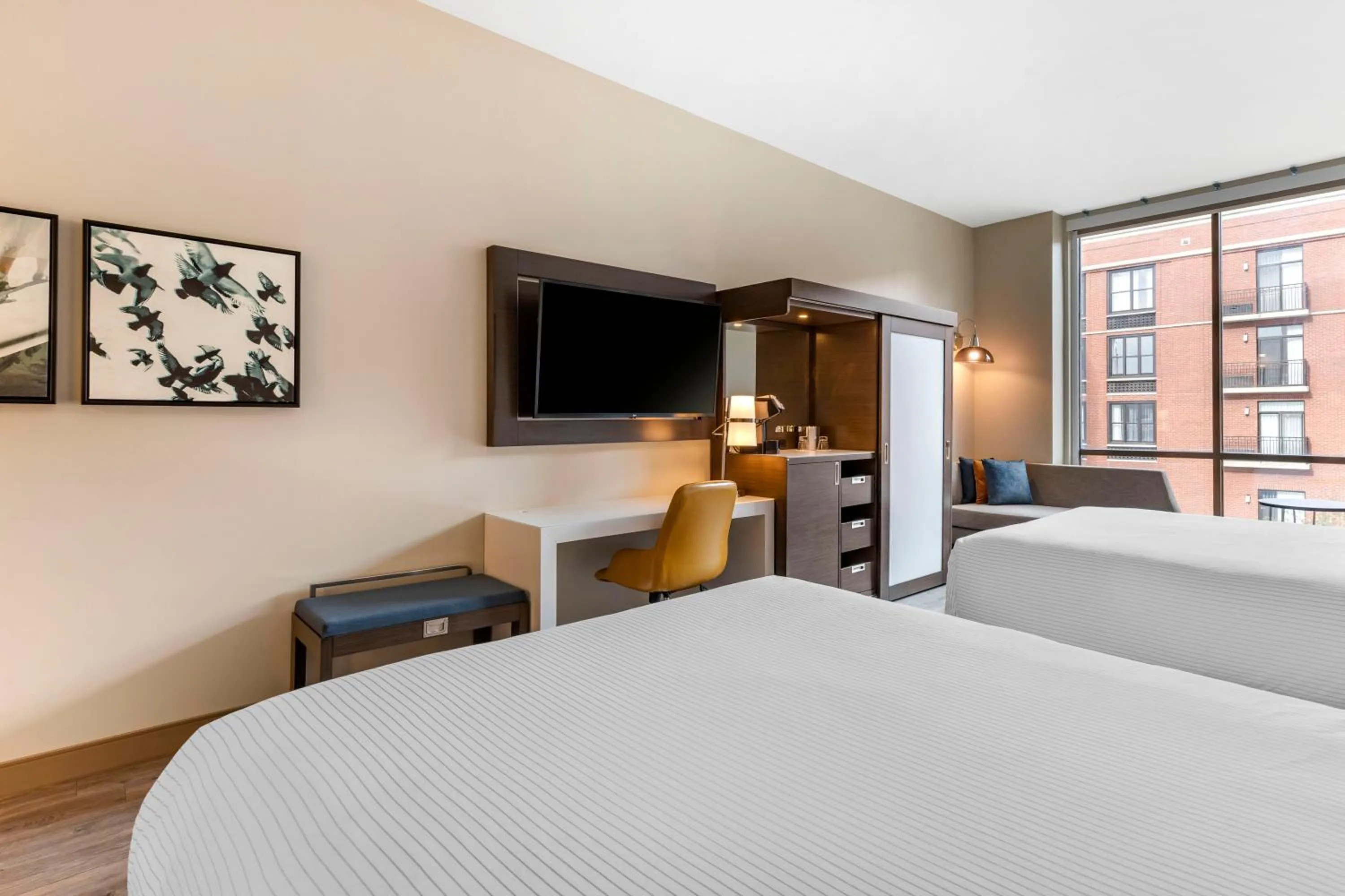 Bed in Cambria Hotel Savannah Downtown Historic District