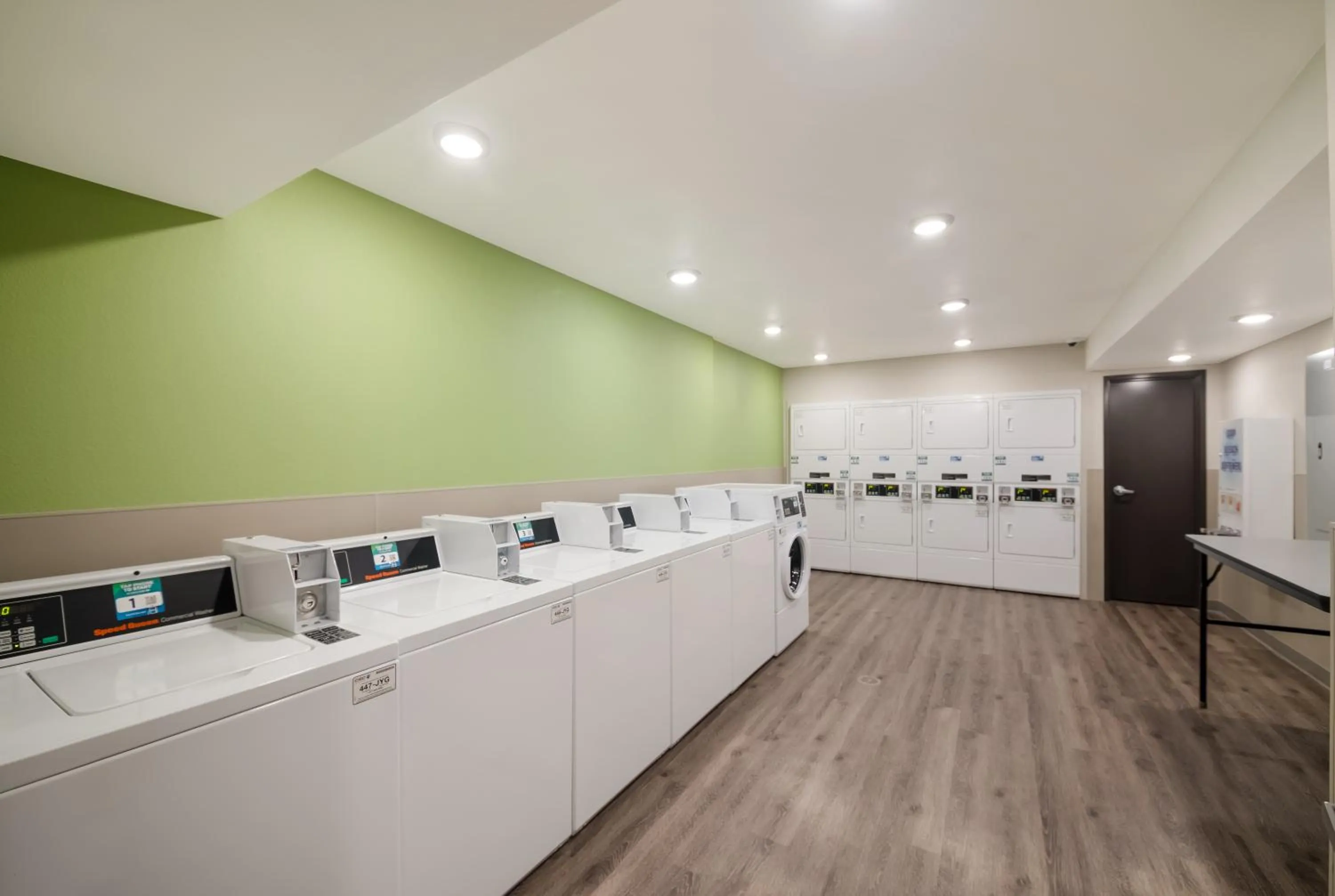 washing machine in WoodSpring Suites Austin Central