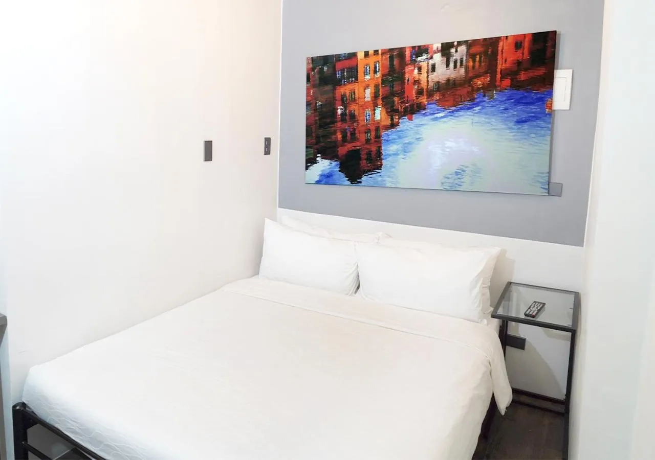 Bed in mySTAY Hotel BGC North