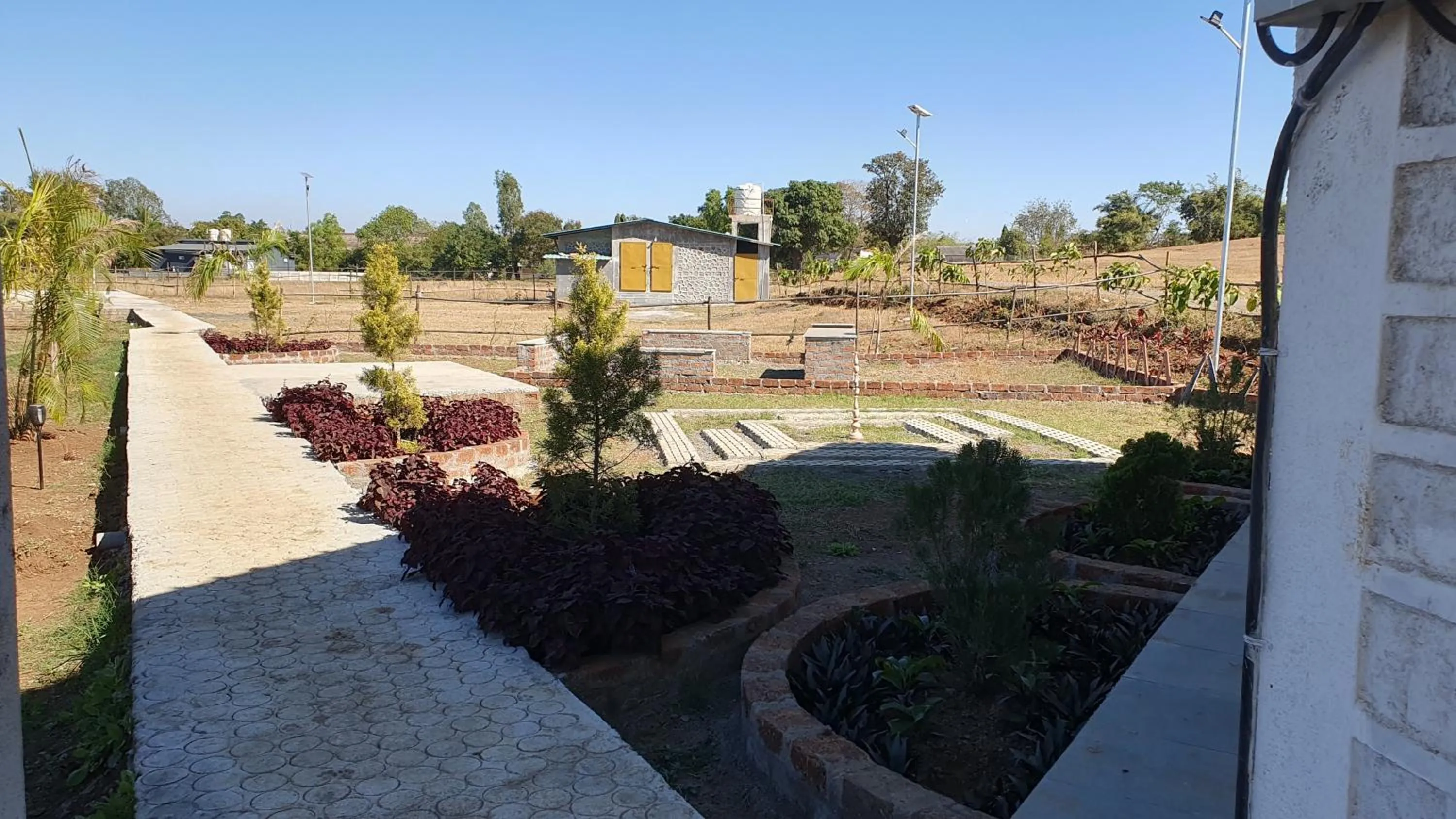 Garden view in Club Shandilya- Cheerful 3BR villa in Nature Lap