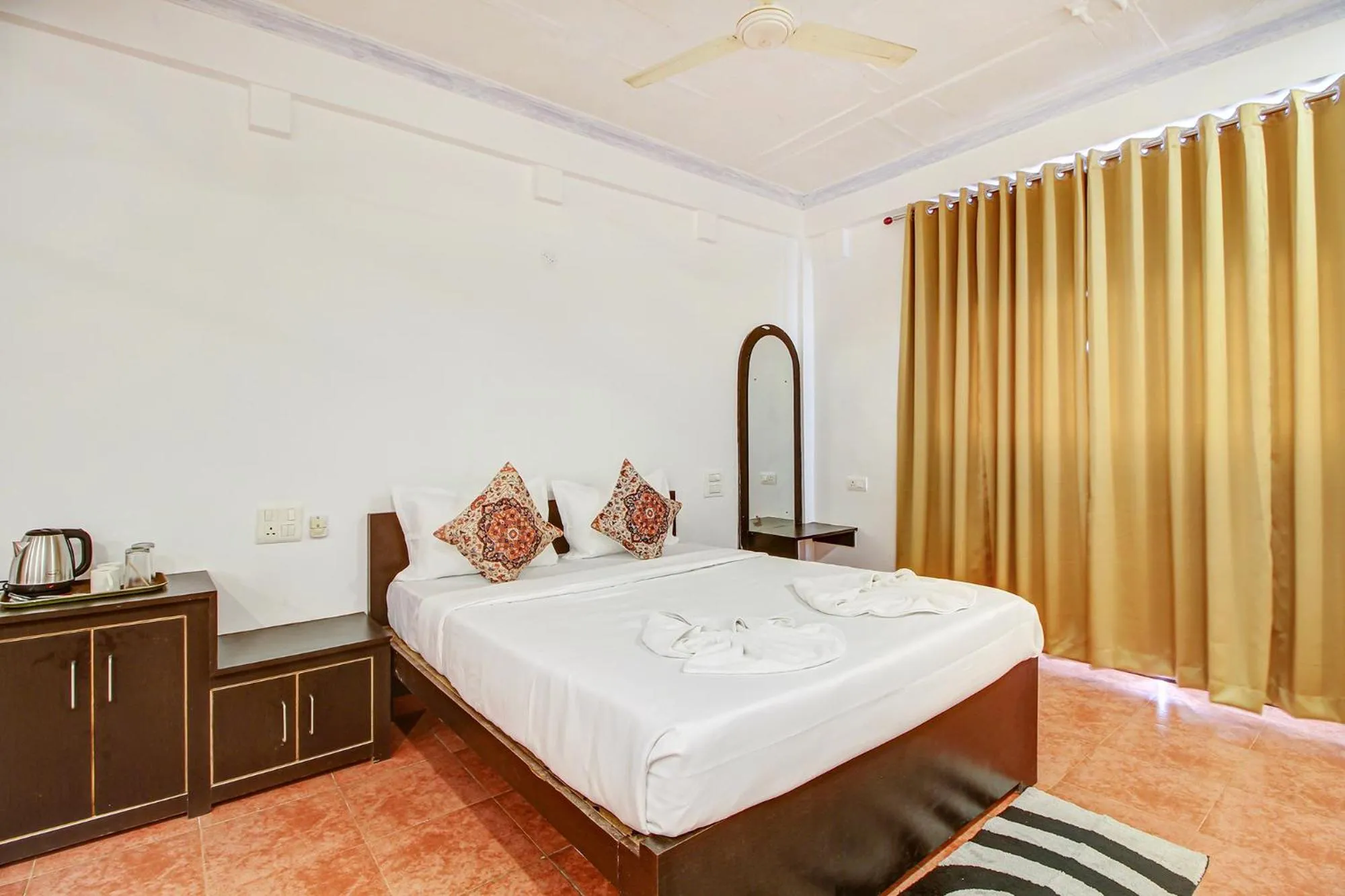 Bed in FabHotel Pleasure Inn