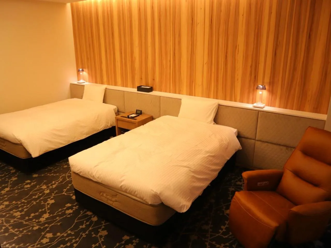 Bed in The Legato Inn MIFUNE