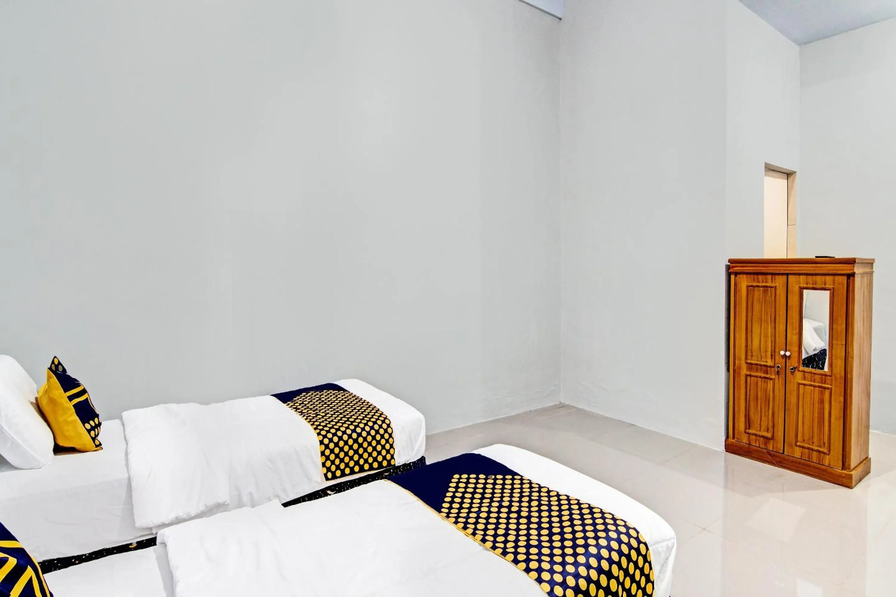 Bedroom in Hotel O Rumah Singgah Kinaya Syariah