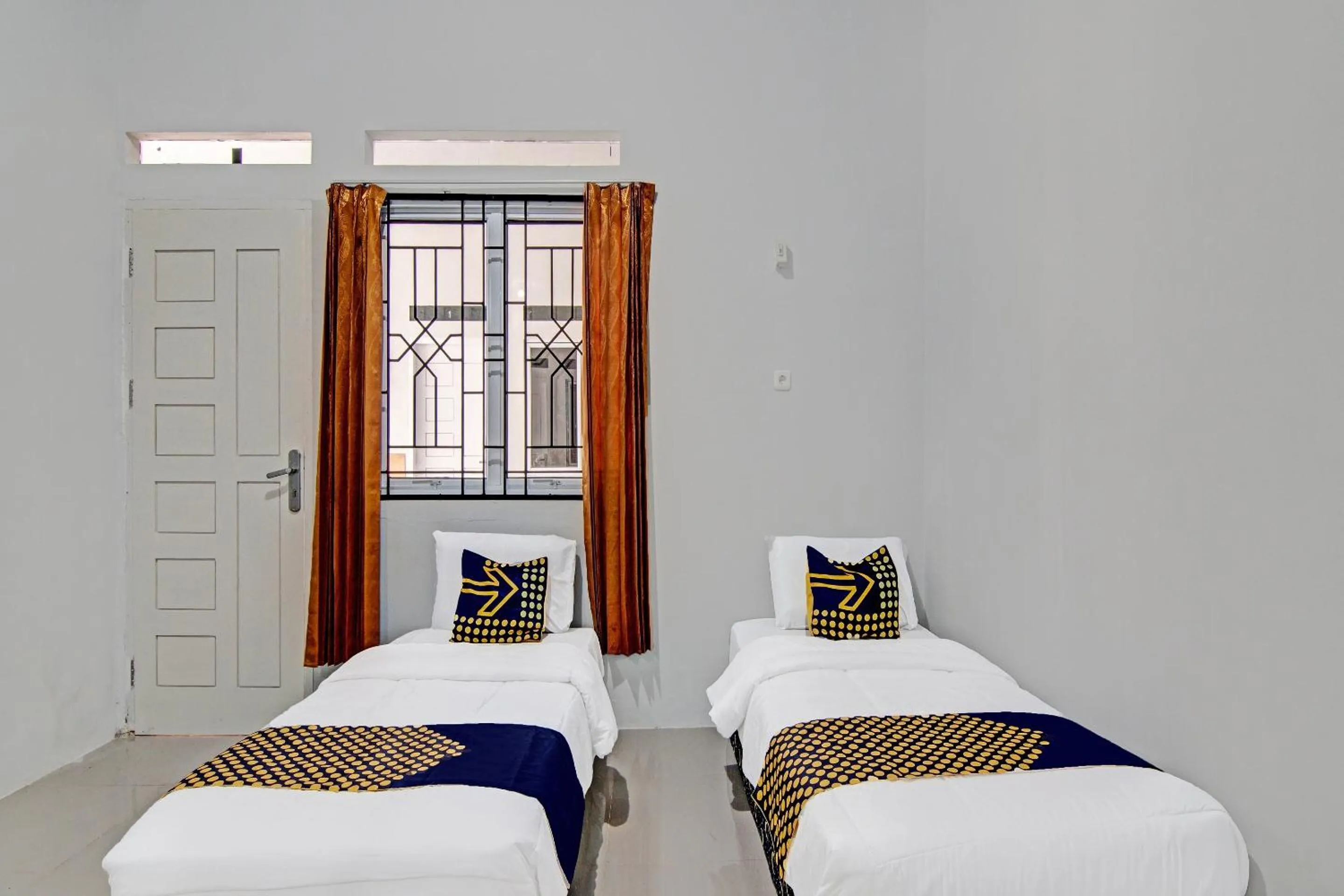 Bedroom in Hotel O Rumah Singgah Kinaya Syariah