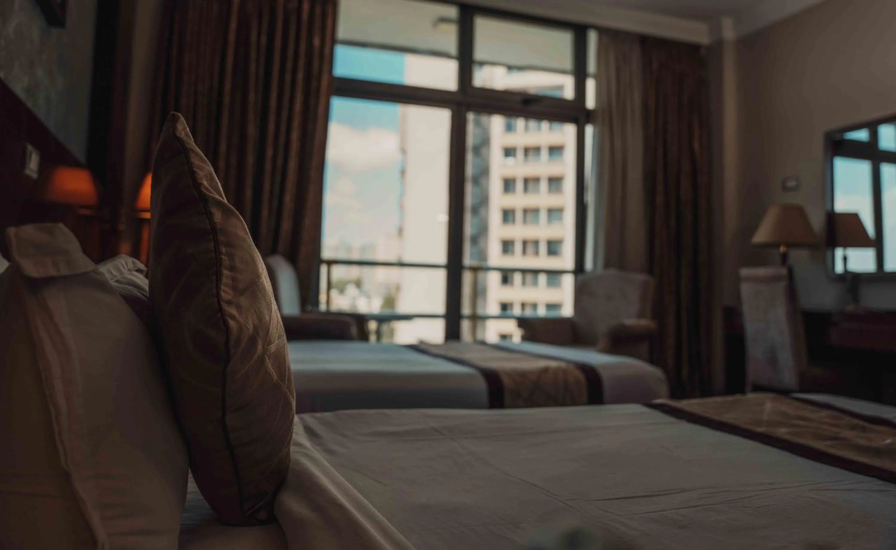 Bed in Sidra International Hotel