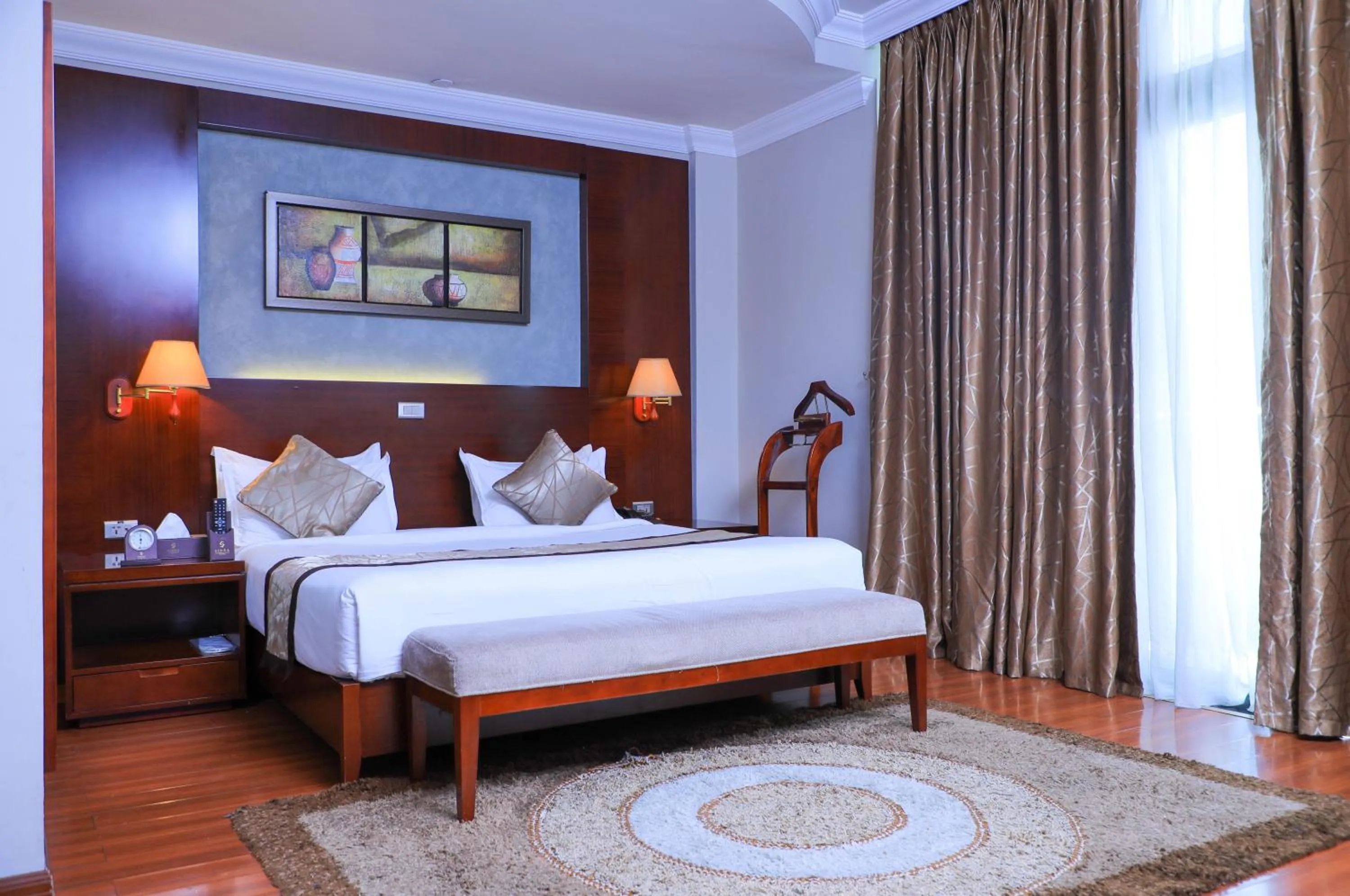 Bed in Sidra International Hotel