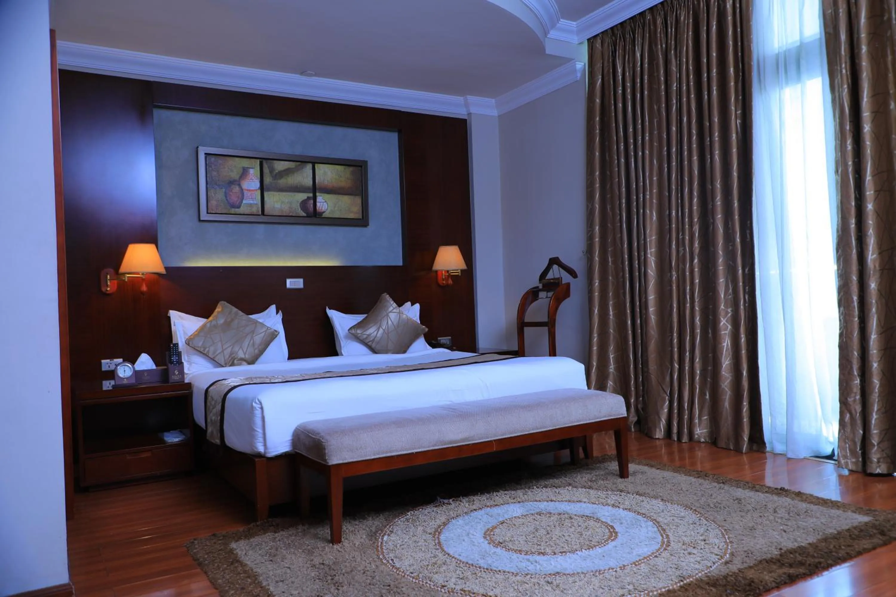 Bed in Sidra International Hotel