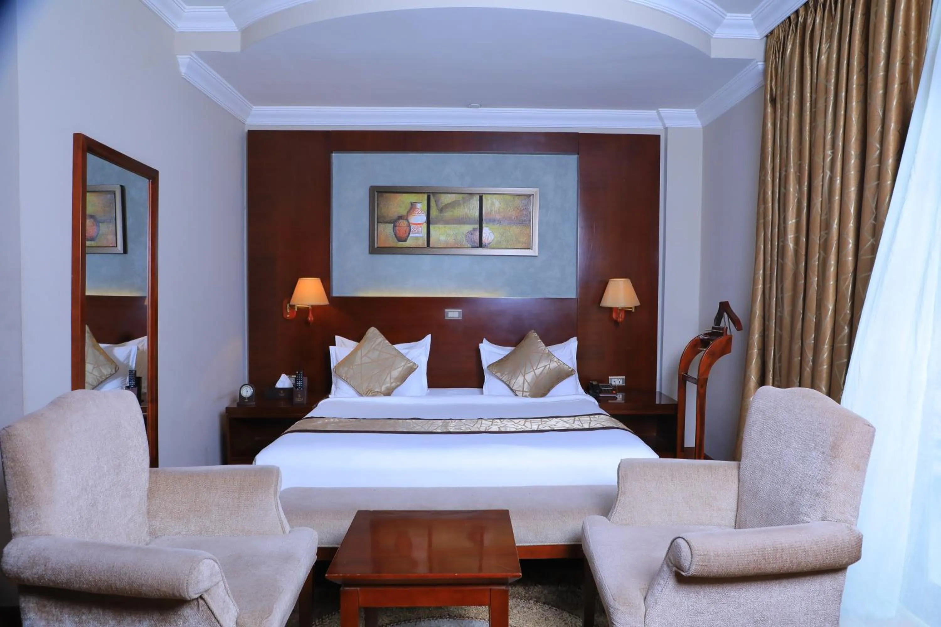 Bed in Sidra International Hotel