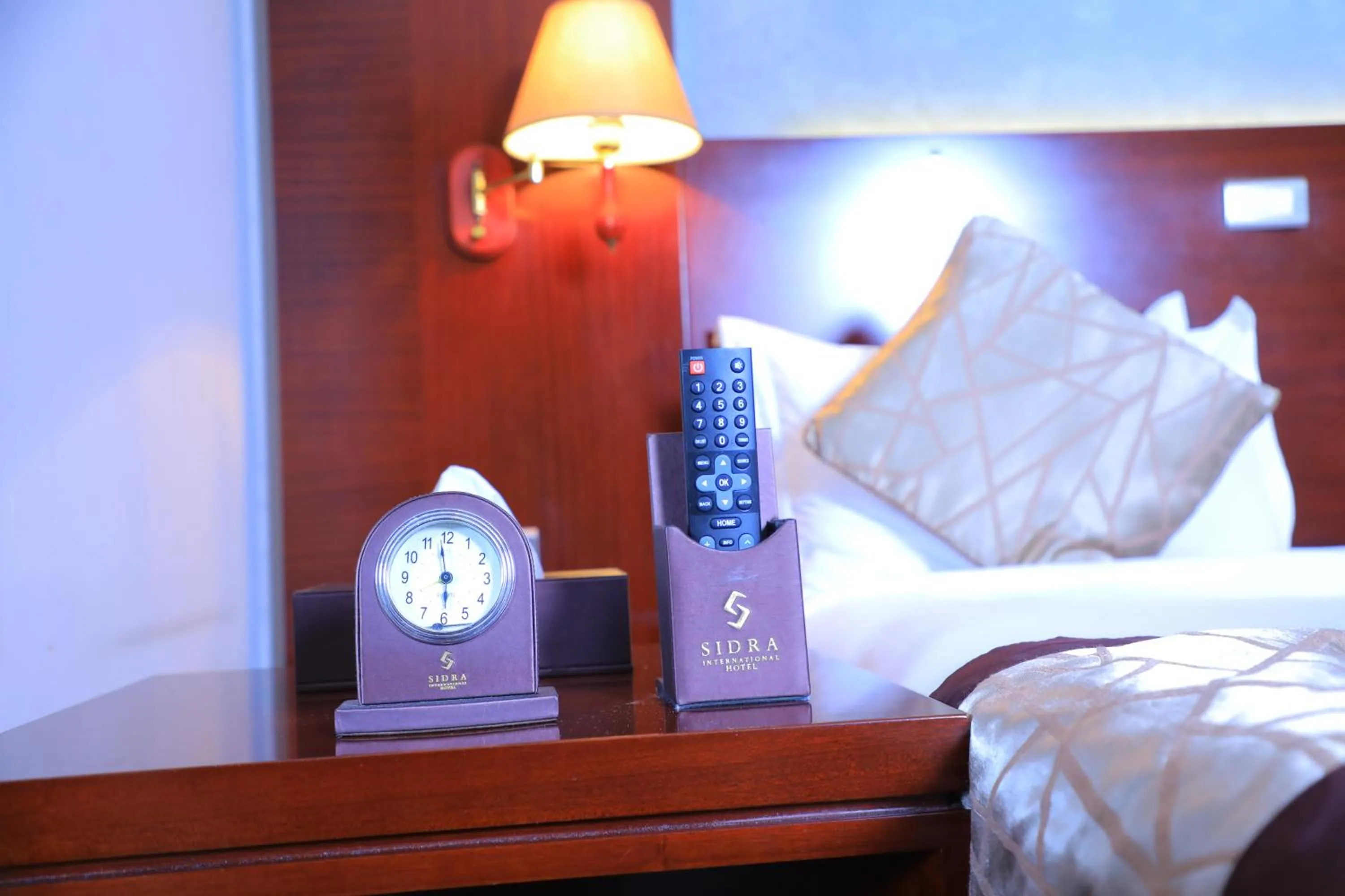 Bed in Sidra International Hotel