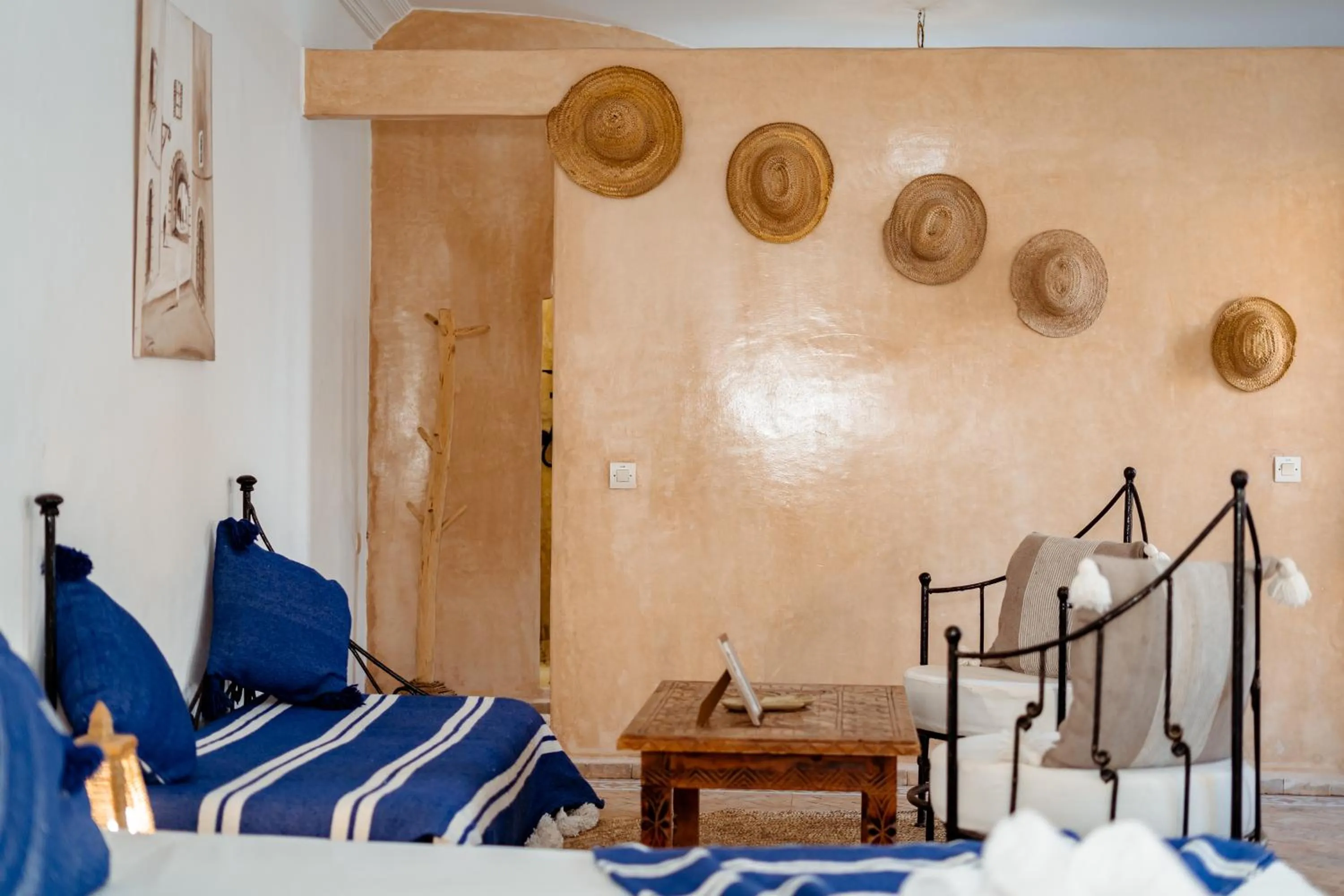 Seating area, Bed in RIAD AMANA