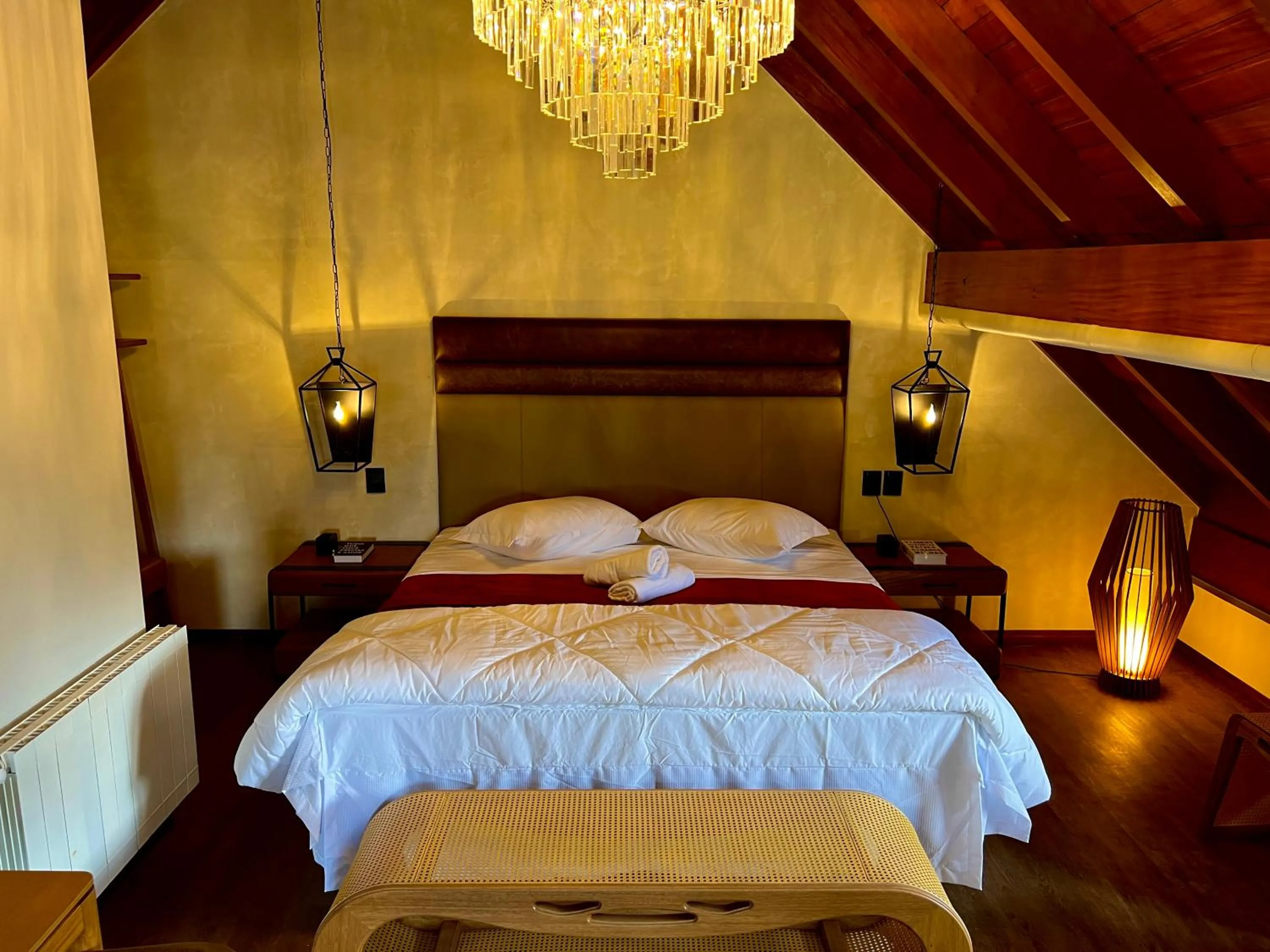 Bed in WoodStone Hotel Fazenda