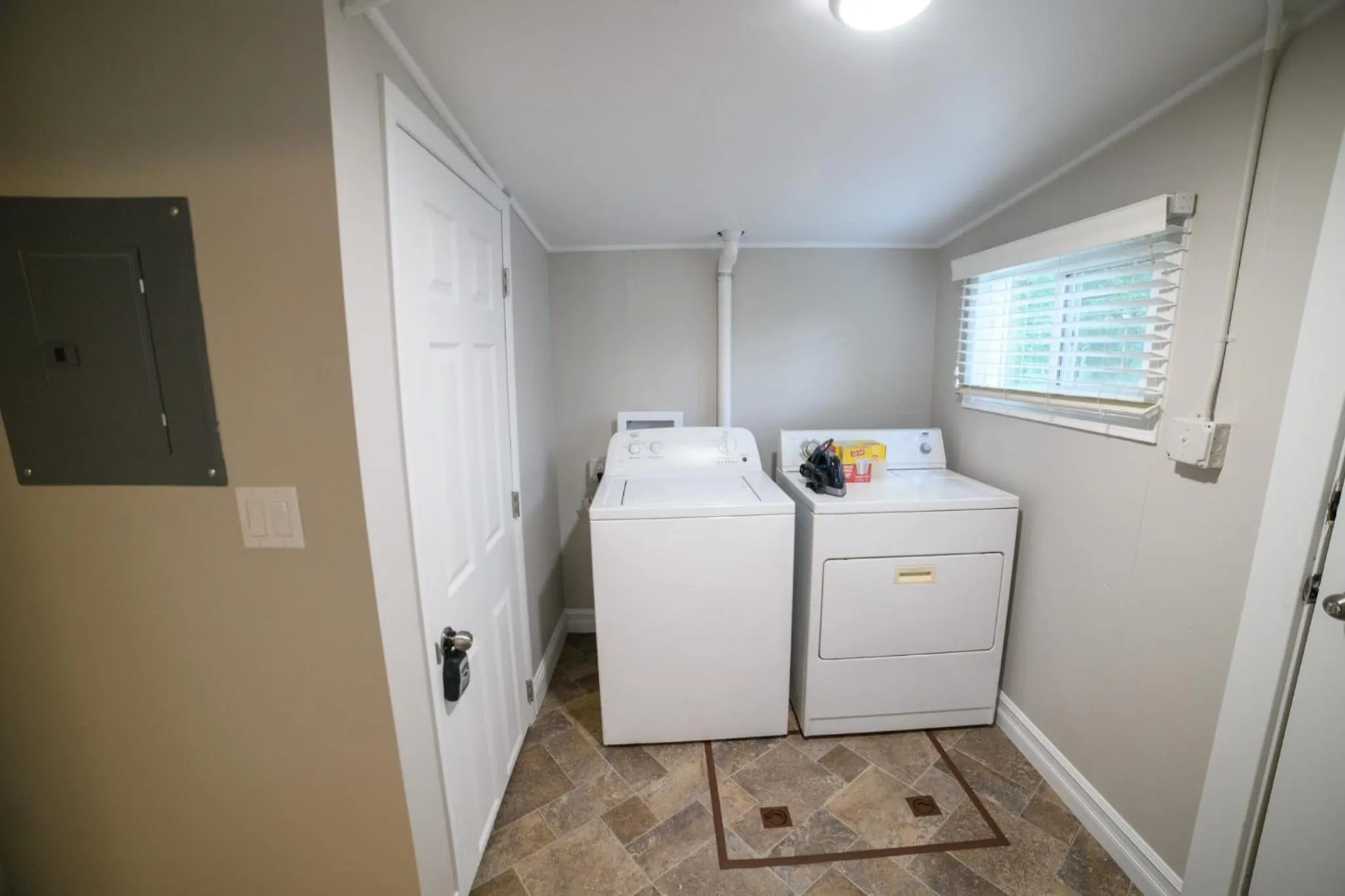 washing machine in Adorable and Cozy Bungalow