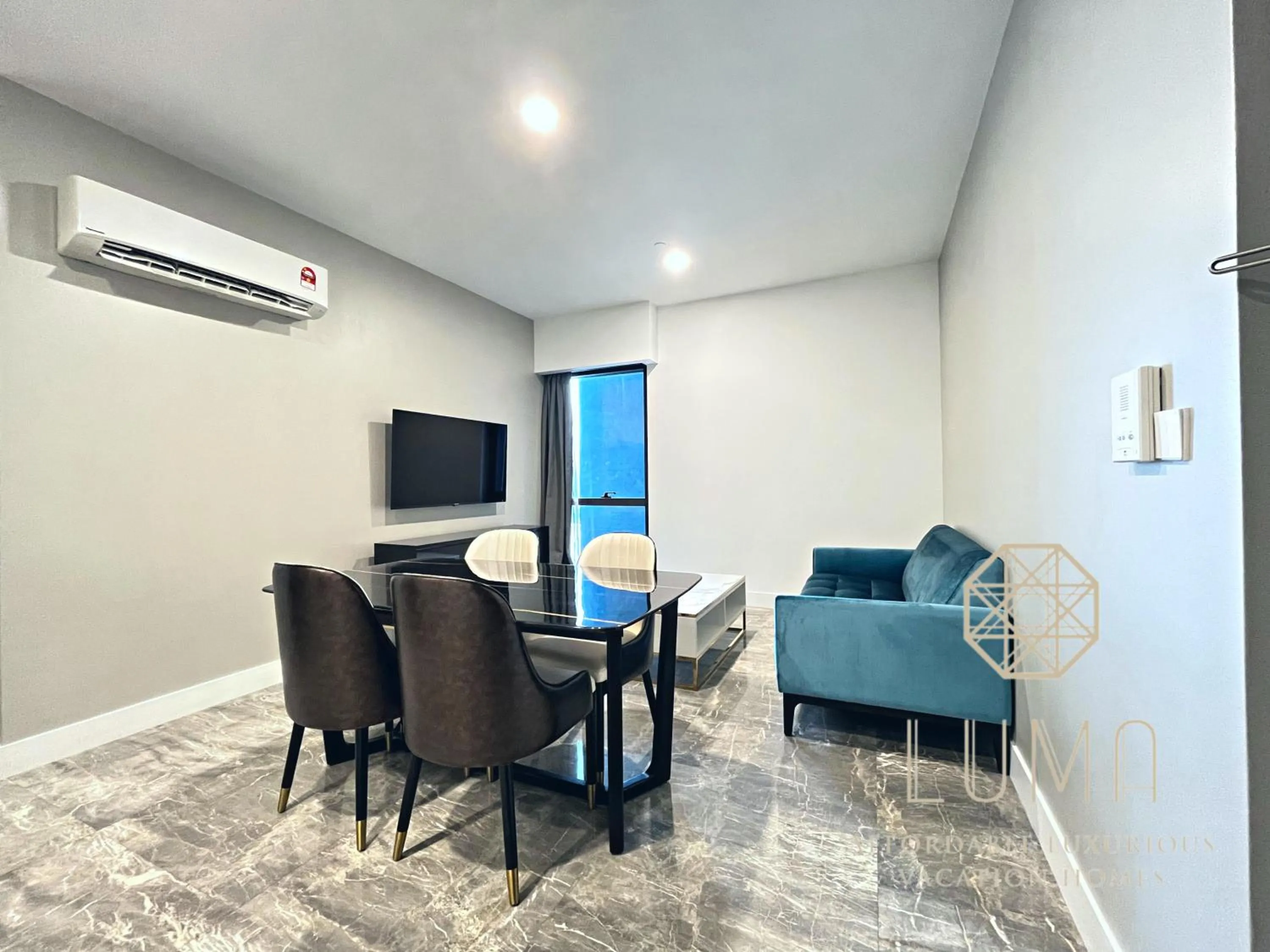 Living room in The Platinum 2 Kuala Lumpur by LUMA