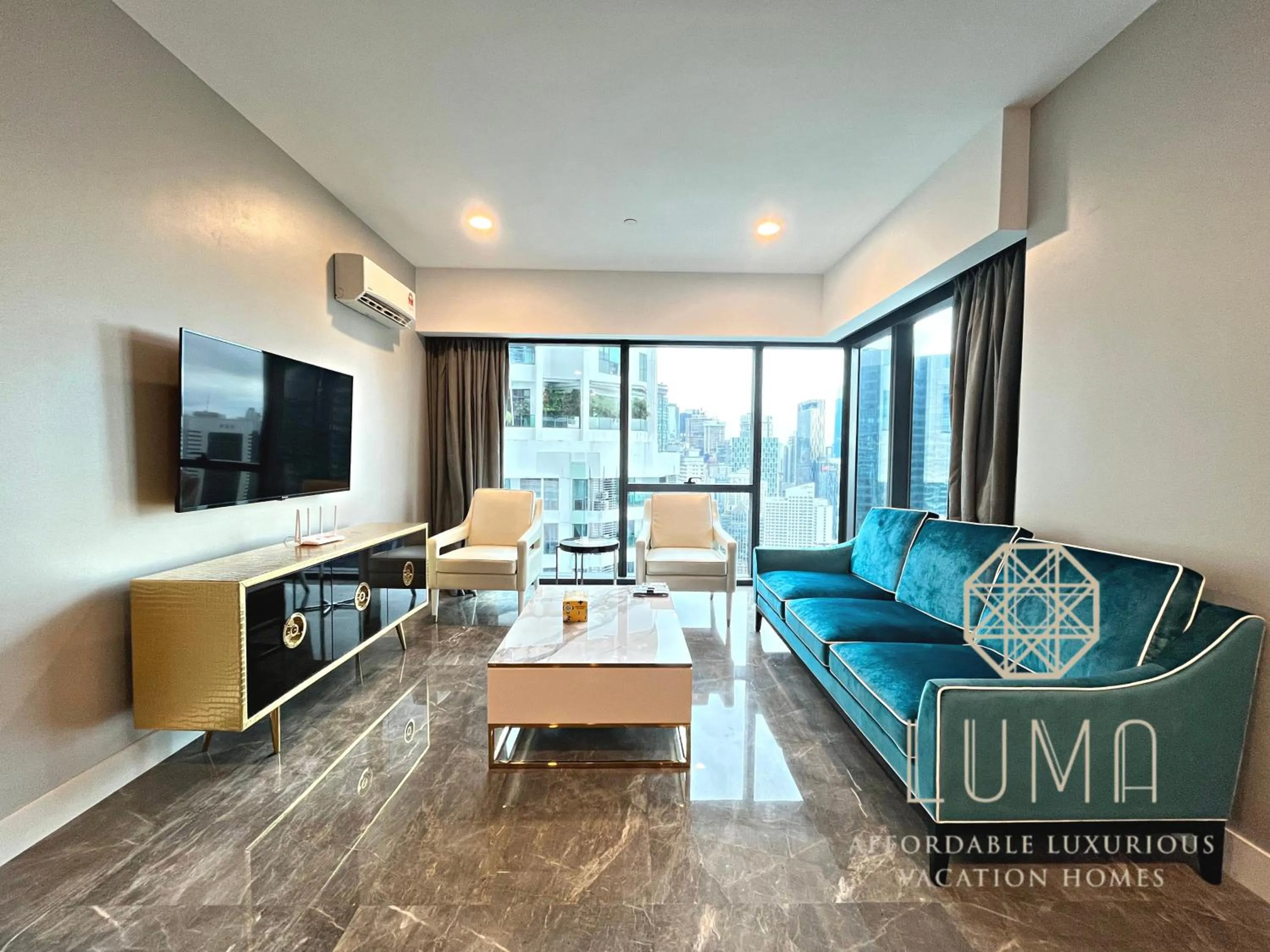 Living room in The Platinum 2 Kuala Lumpur by LUMA