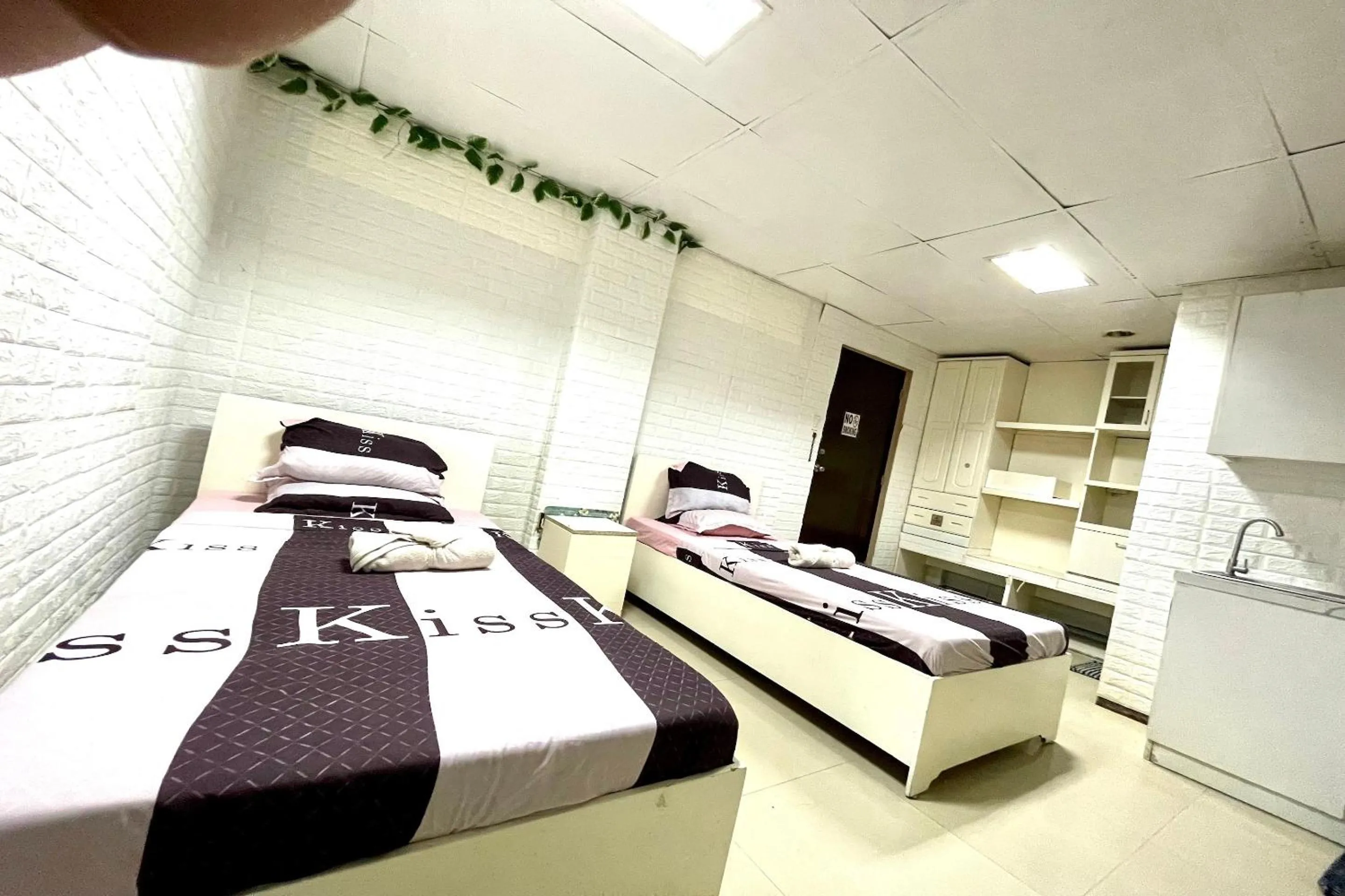 Bedroom in OYO 910 Sabaidee Suites