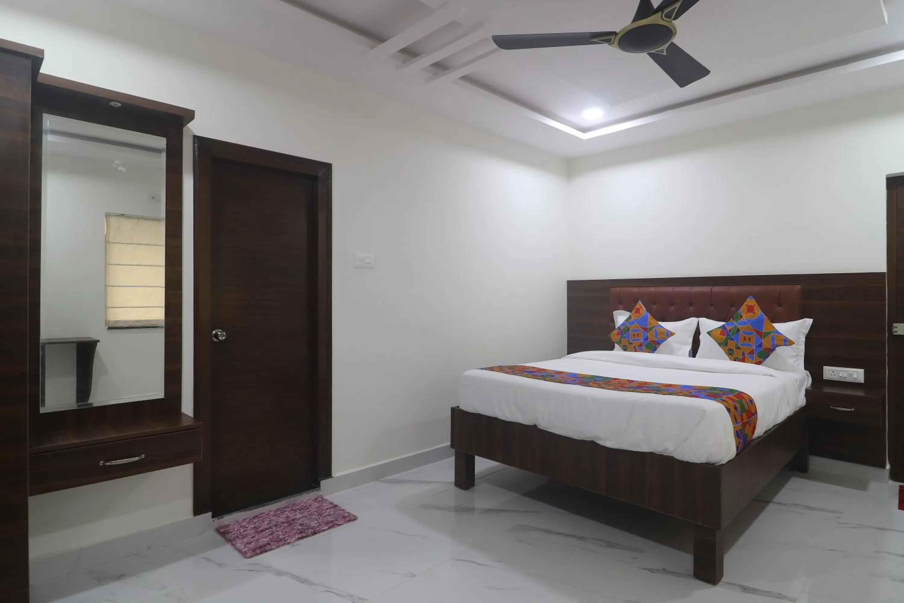 Bed in UNIQUE HOMESTAYS