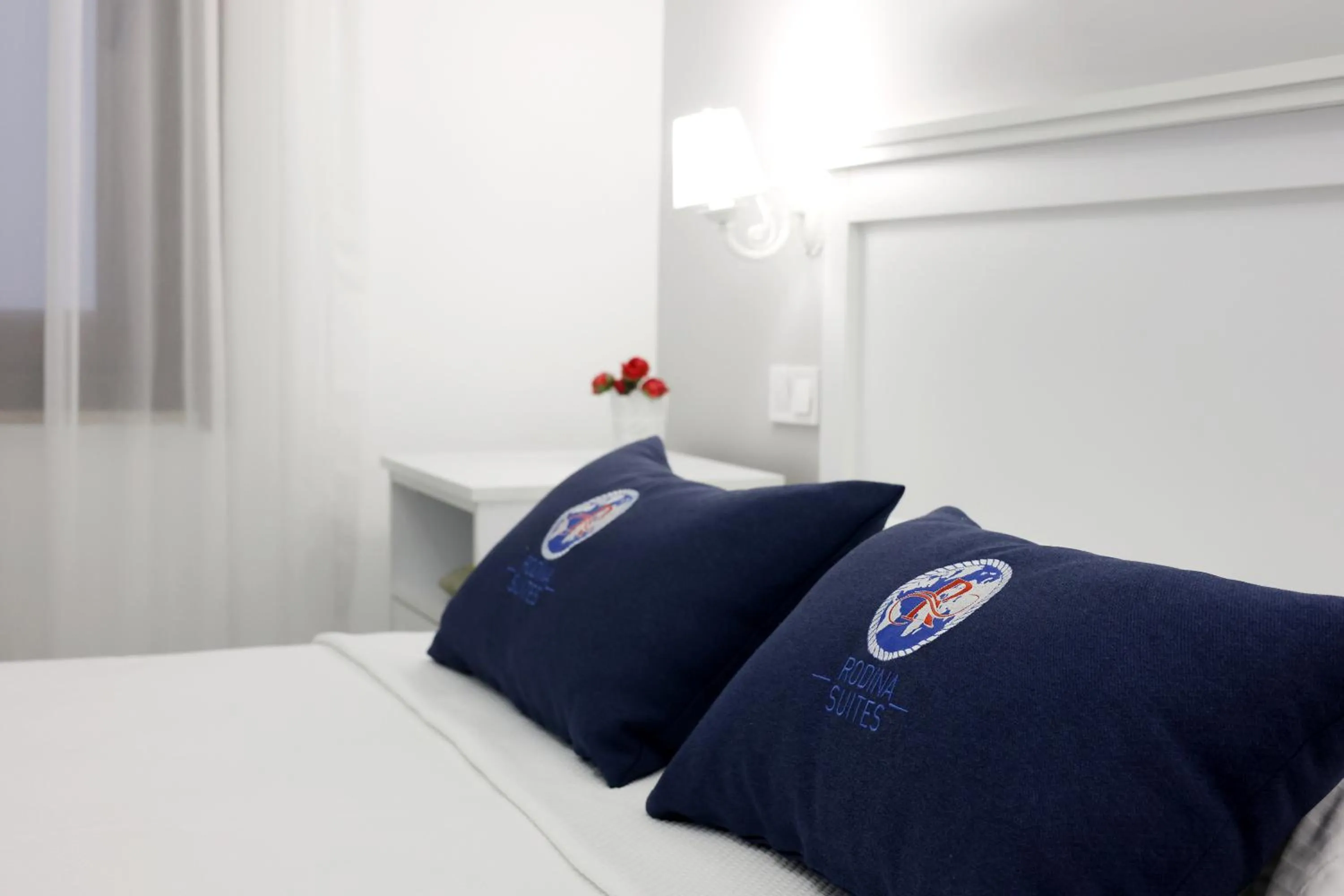 Bedroom, Bed in Rodina Suites Hotel