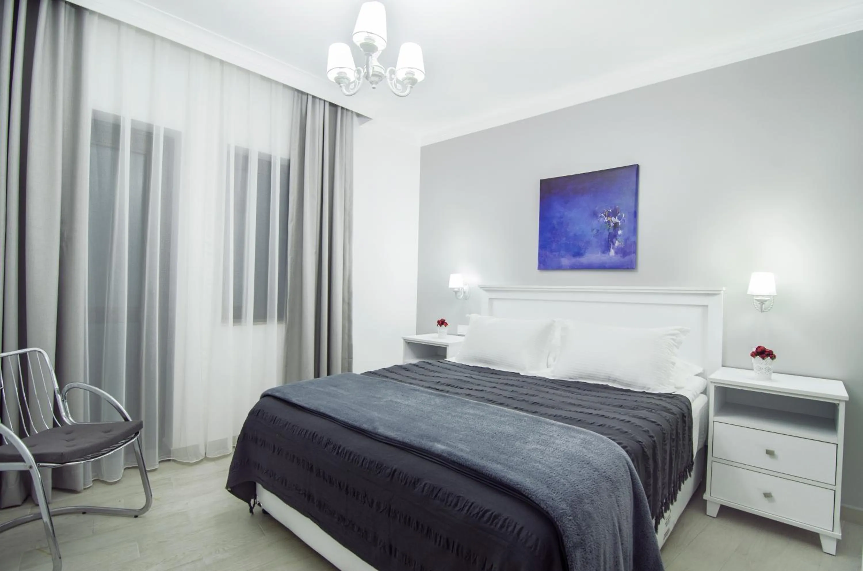 Bedroom, Bed in Rodina Suites Hotel