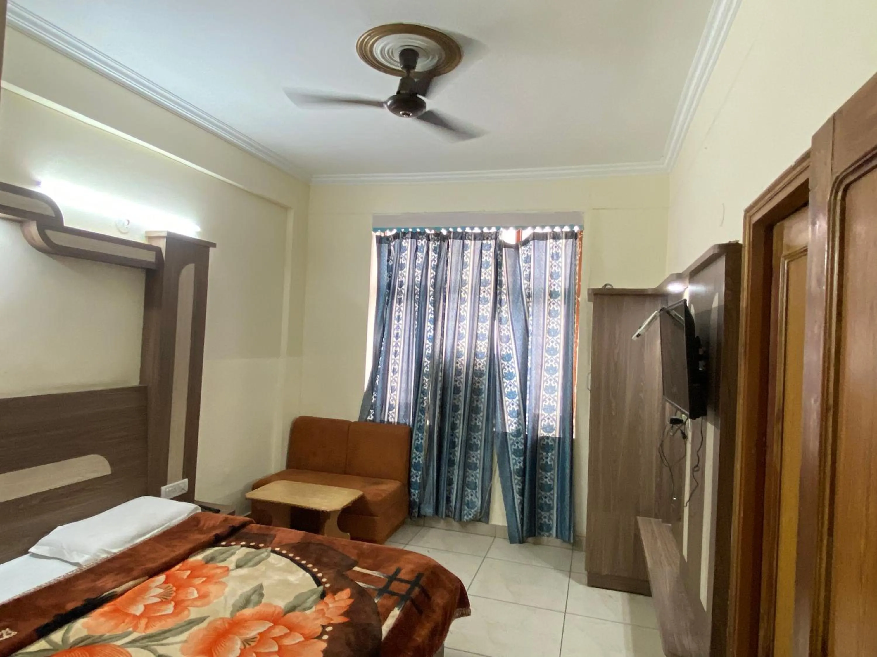 Bed in AASHIRWAD HOTEL