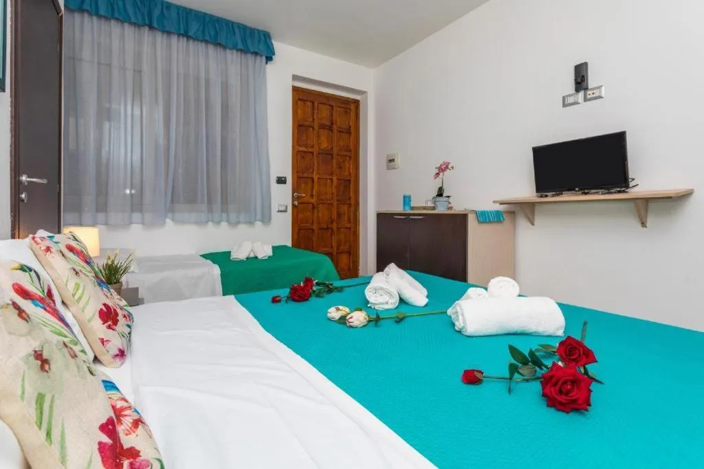 Bed in Sirina House Taormina