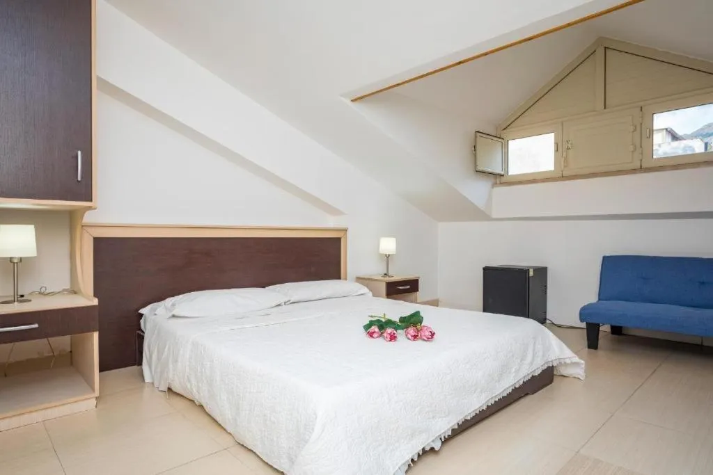 Bed in Sirina House Taormina