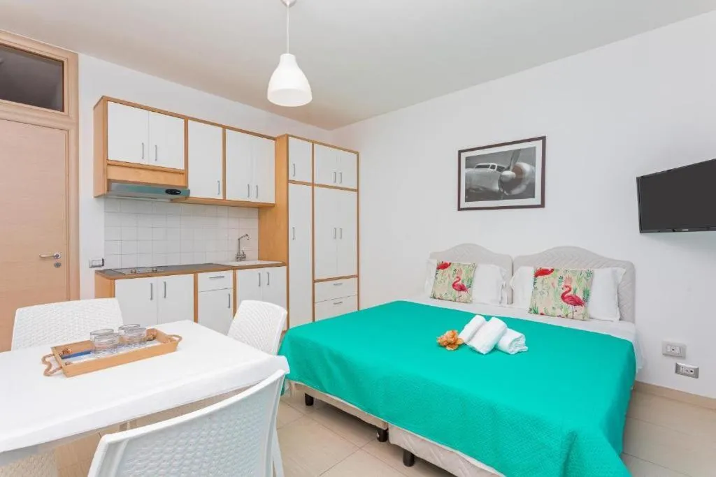 Bed in Sirina House Taormina