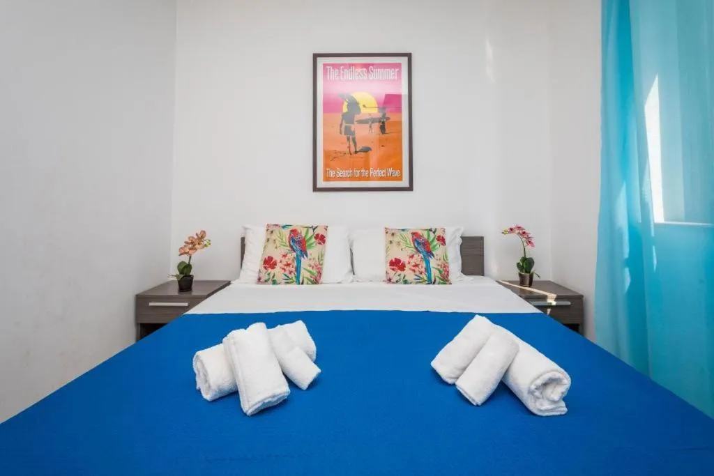 Bed in Sirina House Taormina