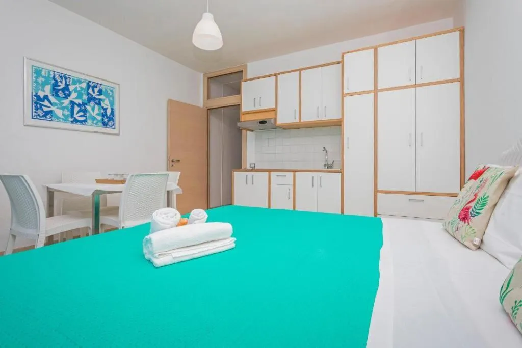 Bed in Sirina House Taormina