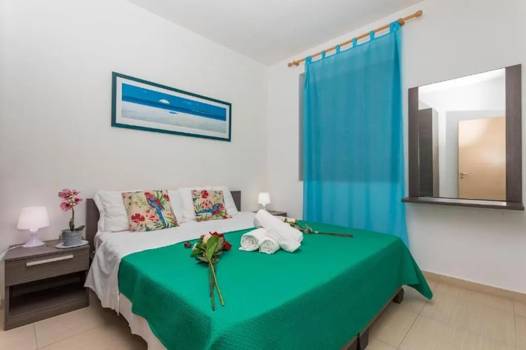 Bed in Sirina House Taormina